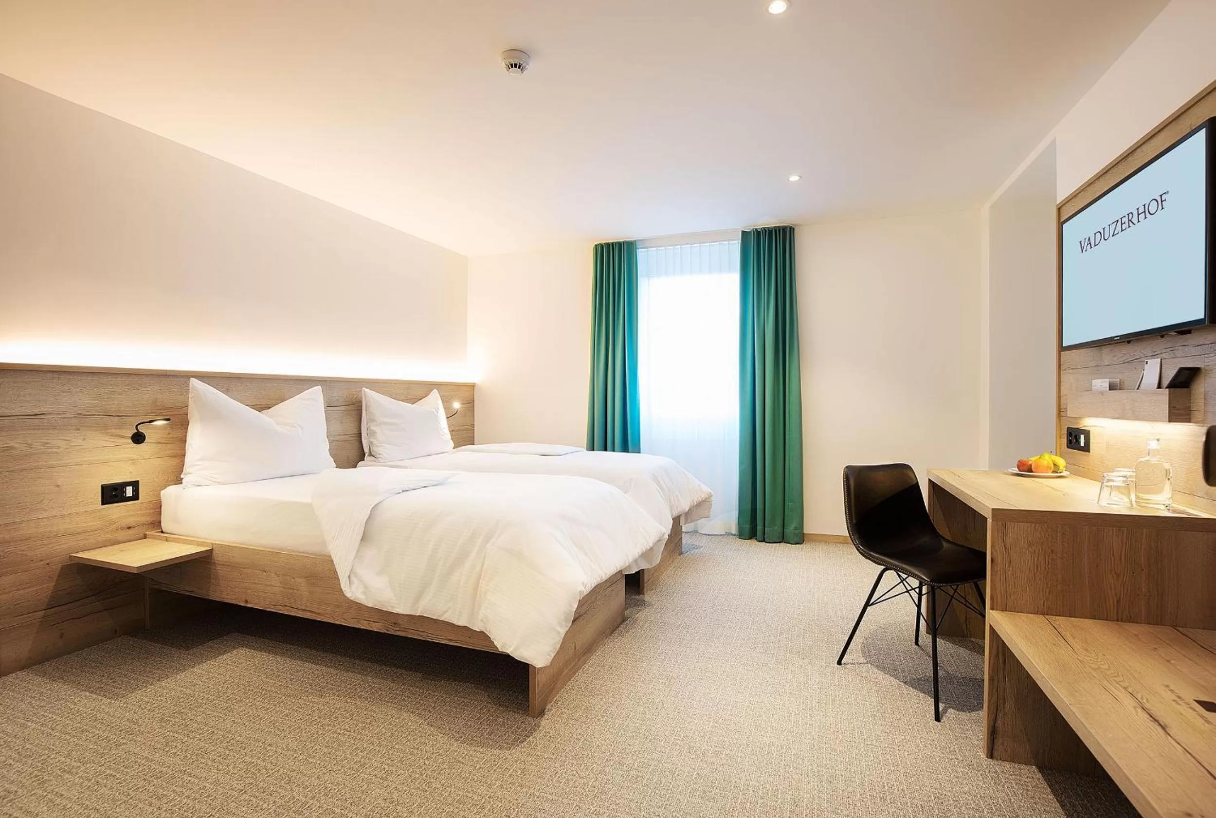 Photo of the whole room, Bed in Hotel Vaduzerhof by b-smart