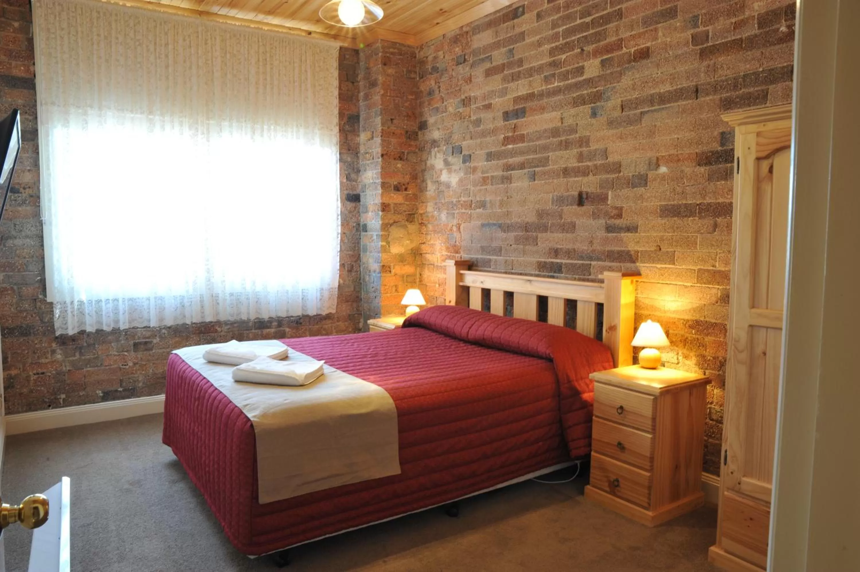 Bed in Black Gold Motel