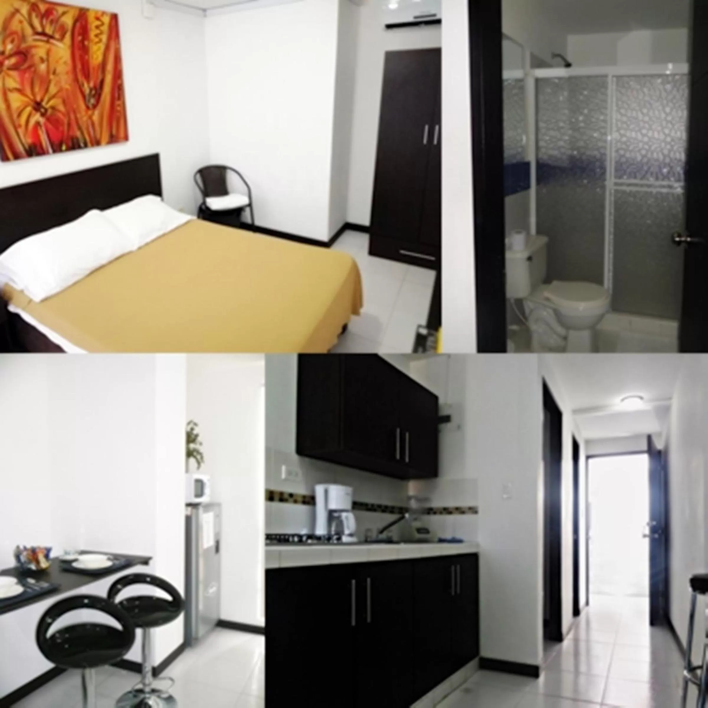 Photo of the whole room in Apartasuites San Marcos