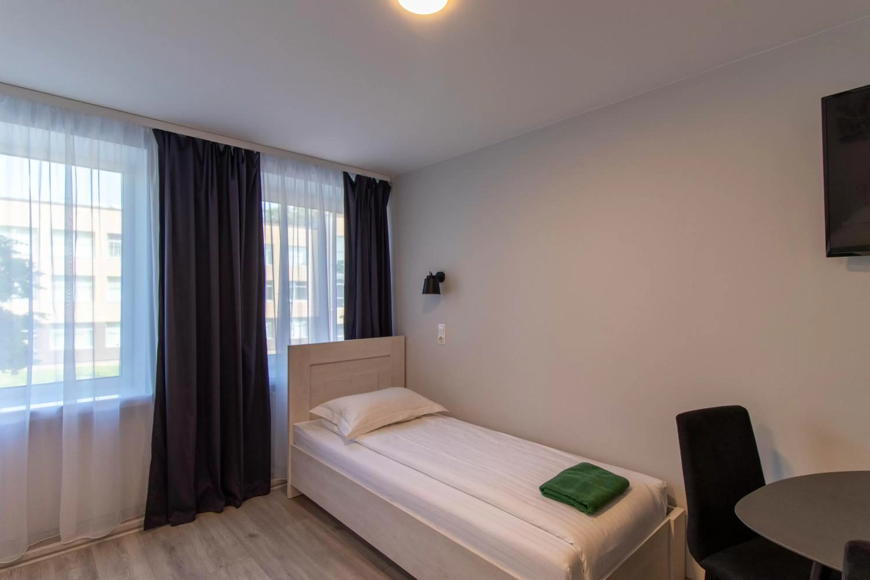 Bed in Dzukija Hotel