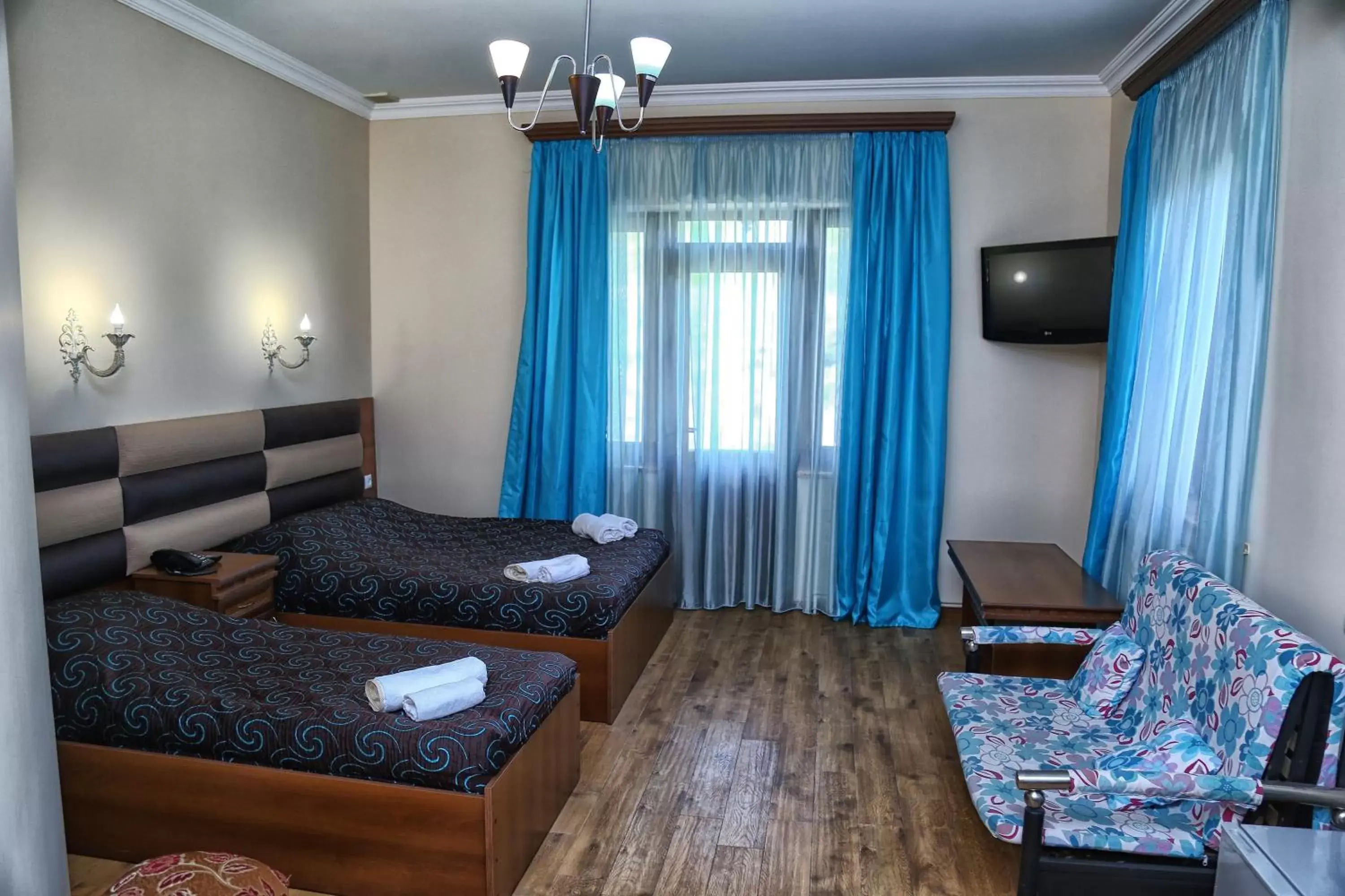 Standard Triple Room in Lara Hotel Standard Triple Room in Lara Hotel