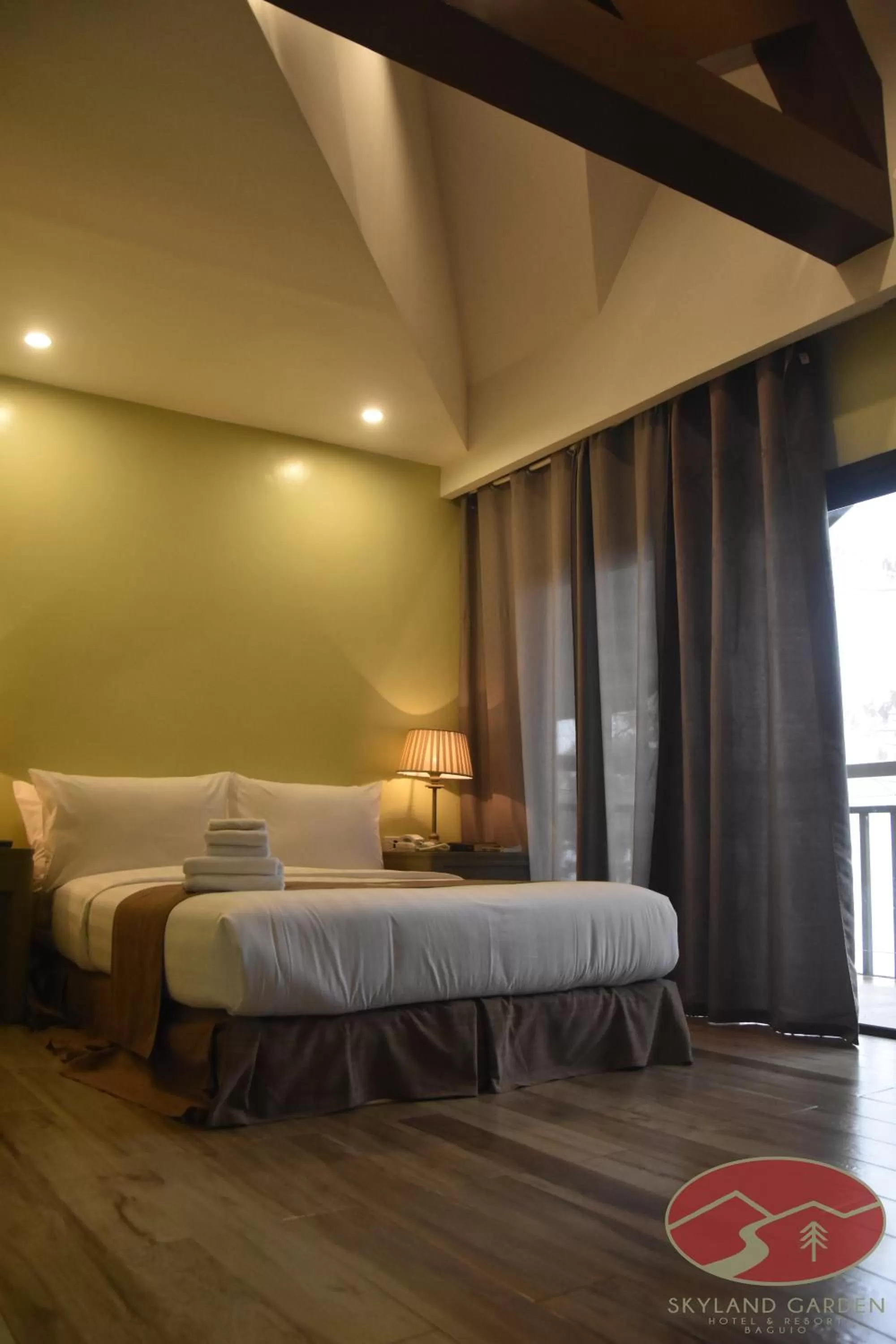 Bed in Skyland Garden Hotel and Resort