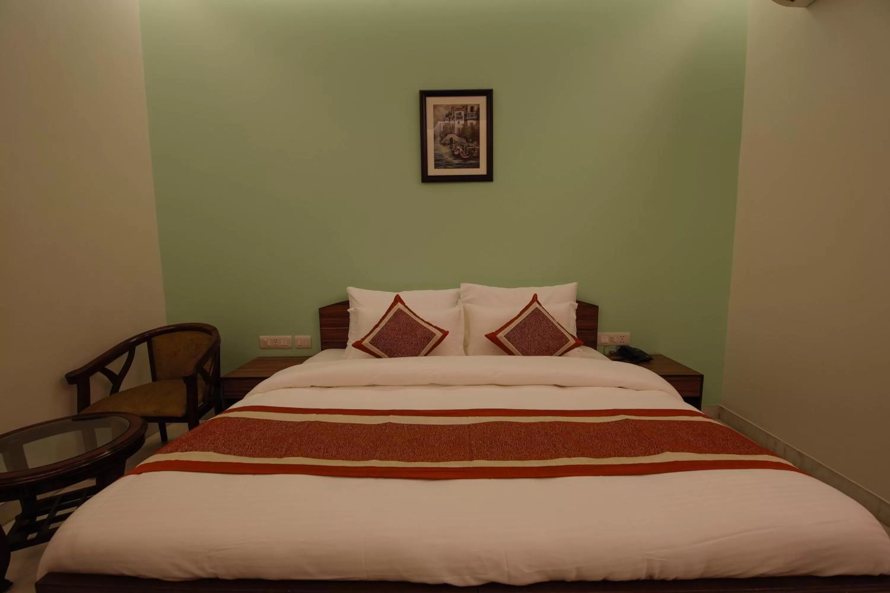 Bed in Peepal Tree Residency