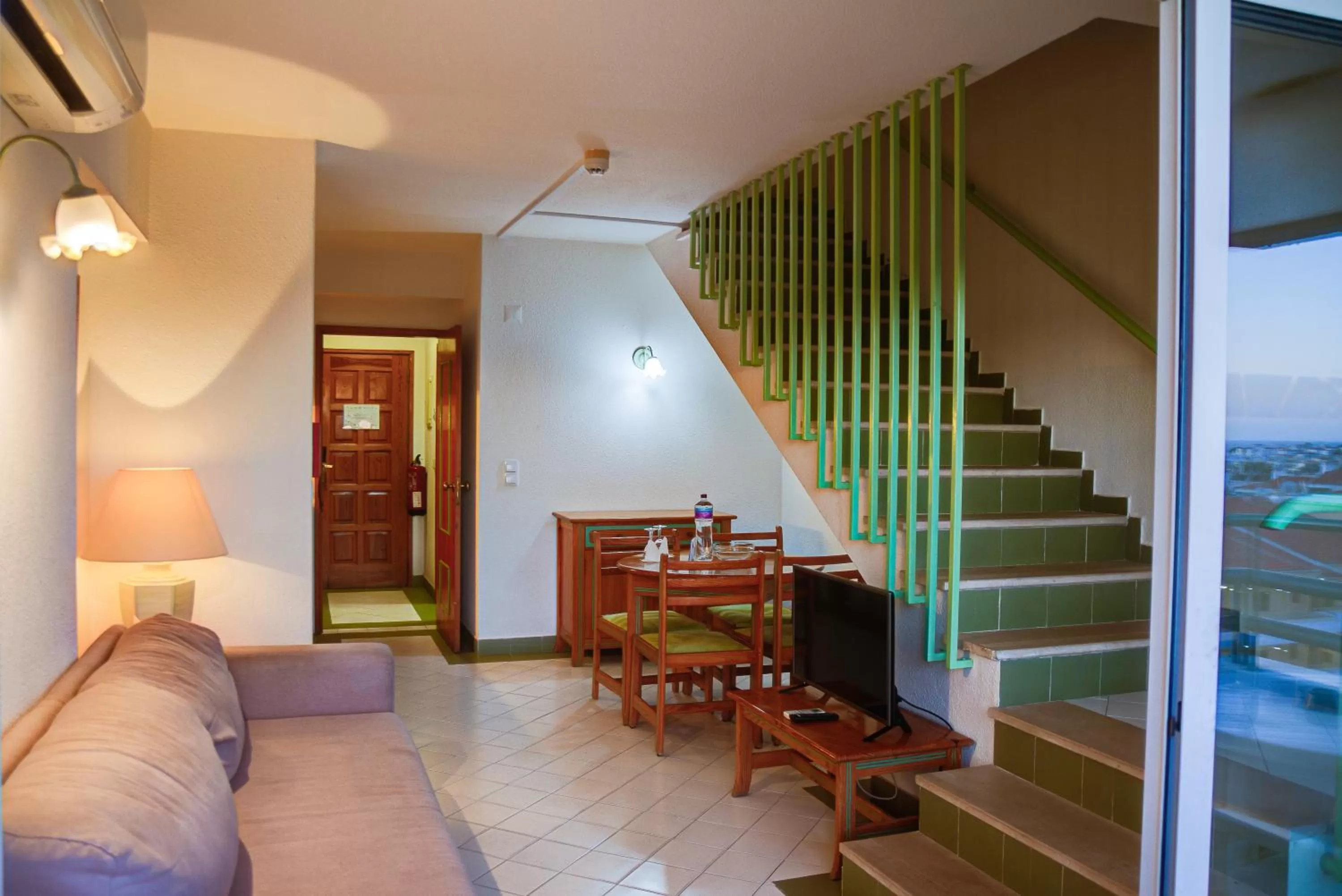 Communal lounge/ TV room in Ourabay Hotel Apartamento - Art & Holidays