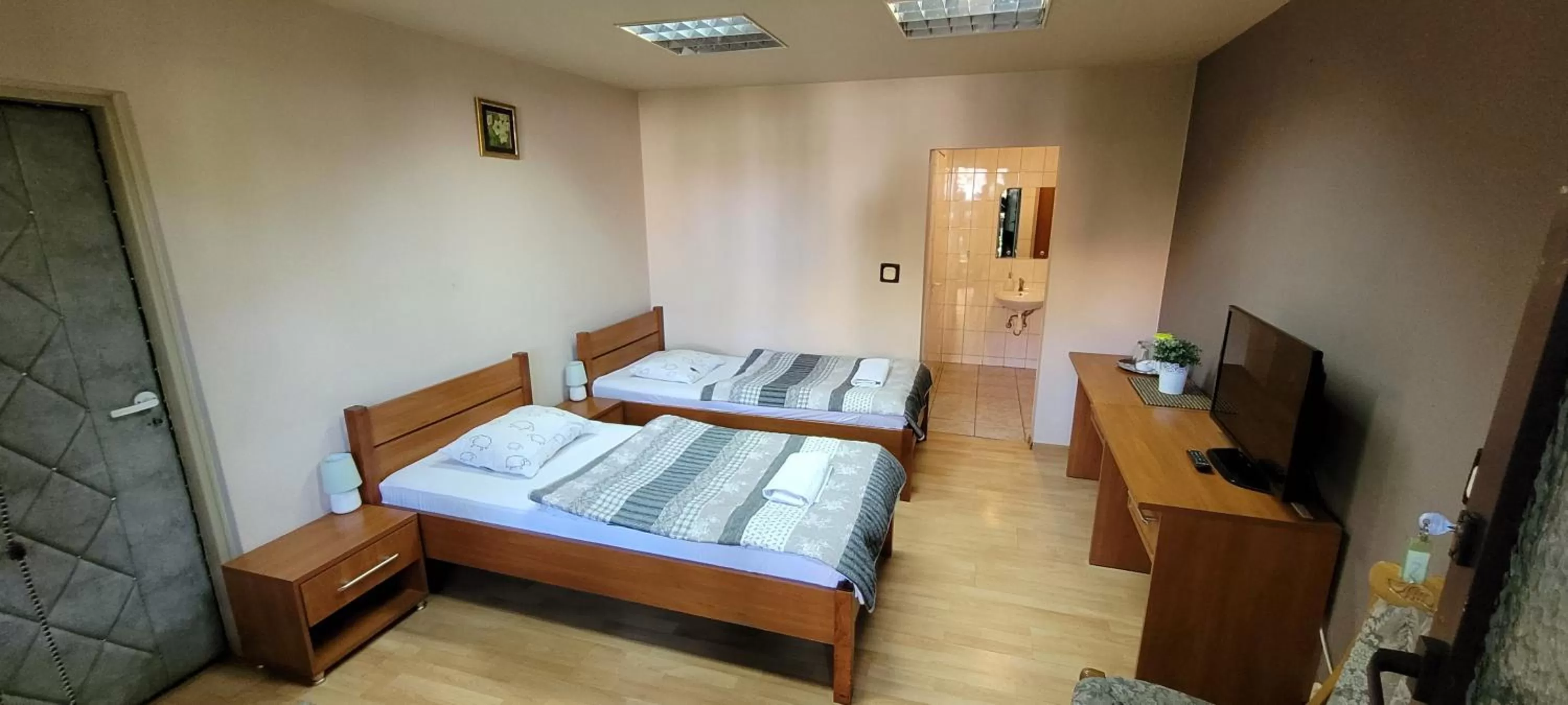 Bed in Dworek Pokoje Gościnne