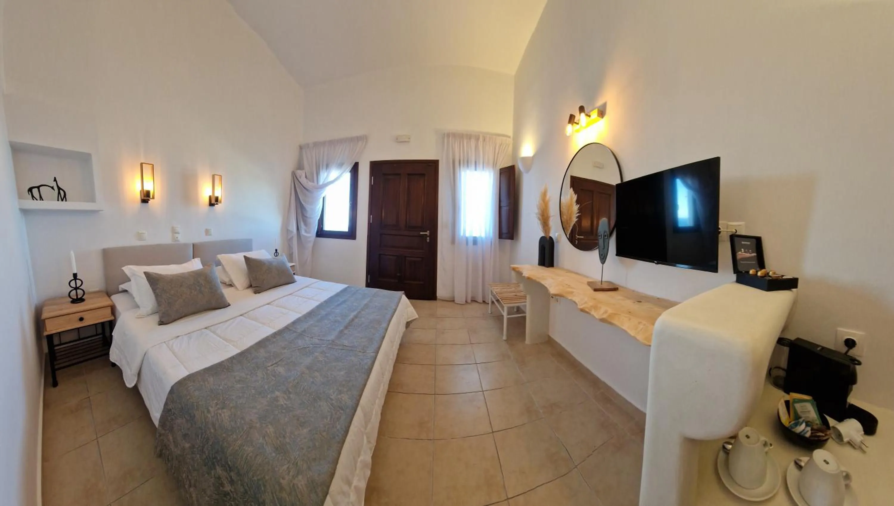 Bed in Amerisa Suites & Villa