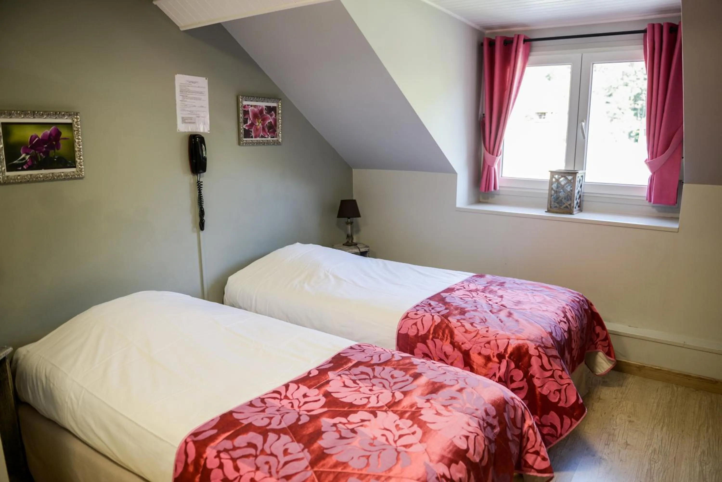 Bed in Logis Le Saint Hubert