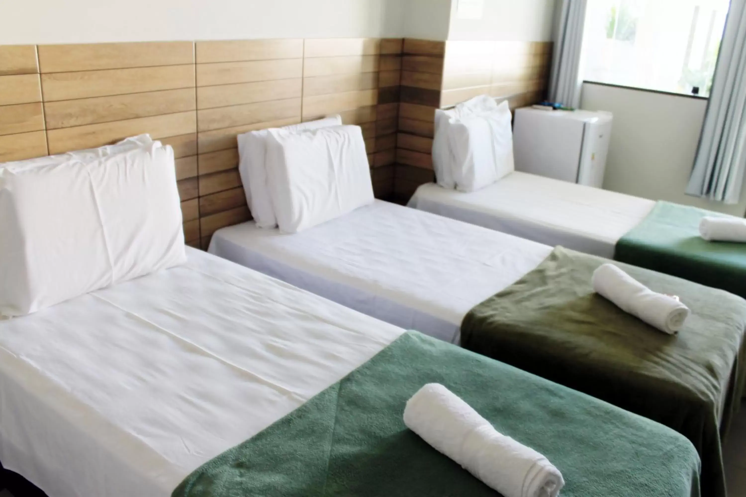 Standard Triple Room in Pousada Das Palmeiras Standard Triple Room in Pousada Das Palmeiras