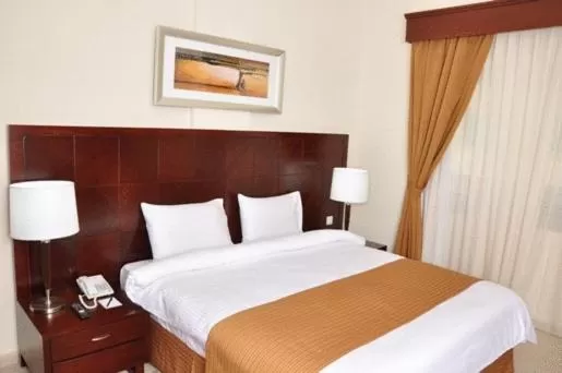 Bed in Akas-Inn Hotel Apartment