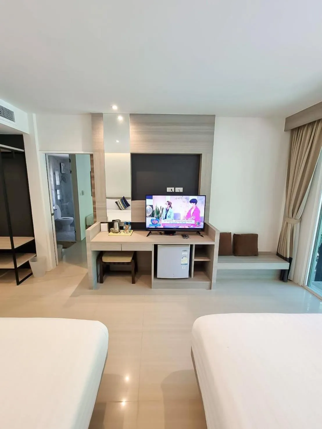 Seating area, Bed in Nirundorn Resort Chaam