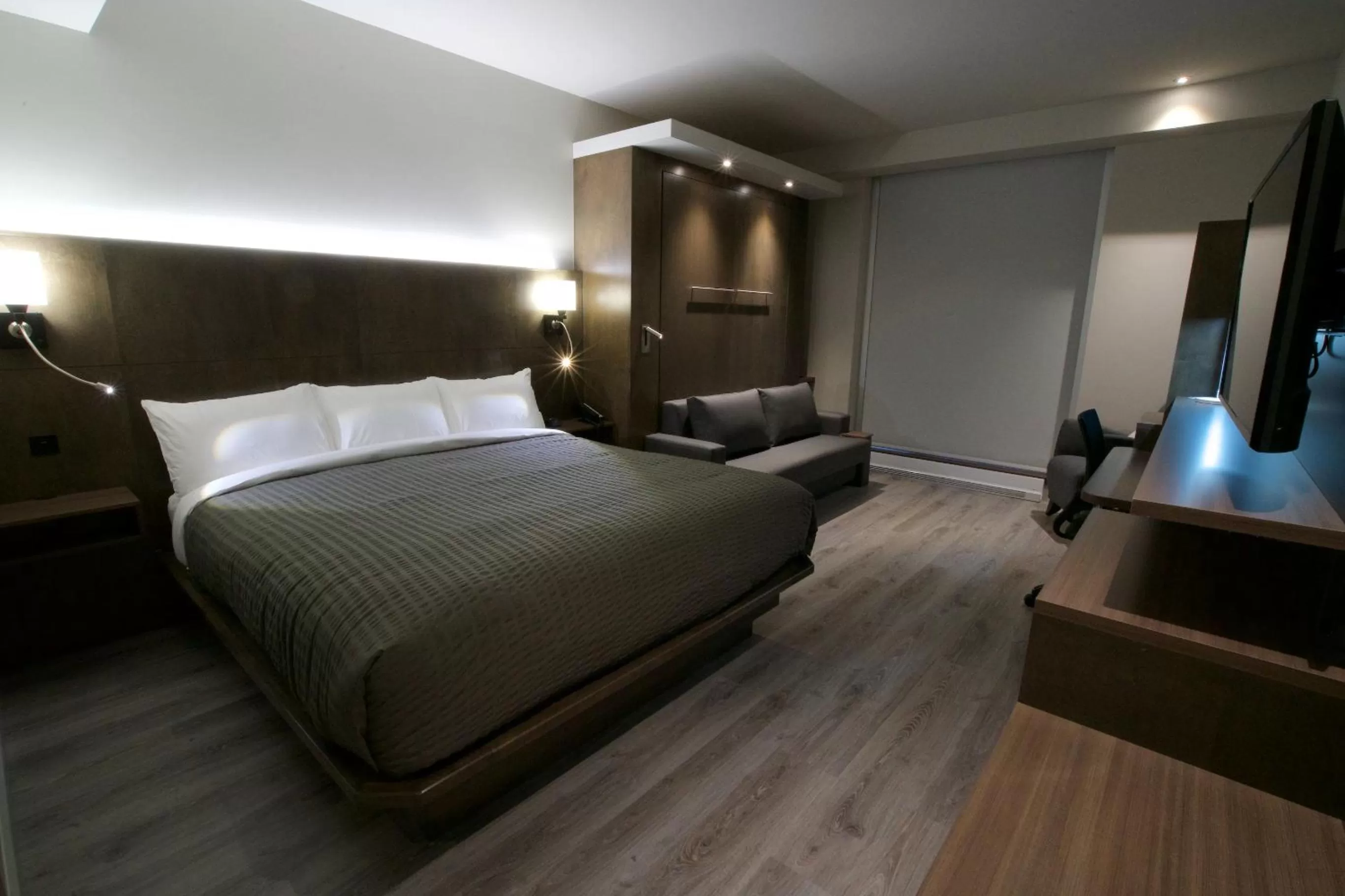 Bed in Hôtel & Suites Normandin Lévis