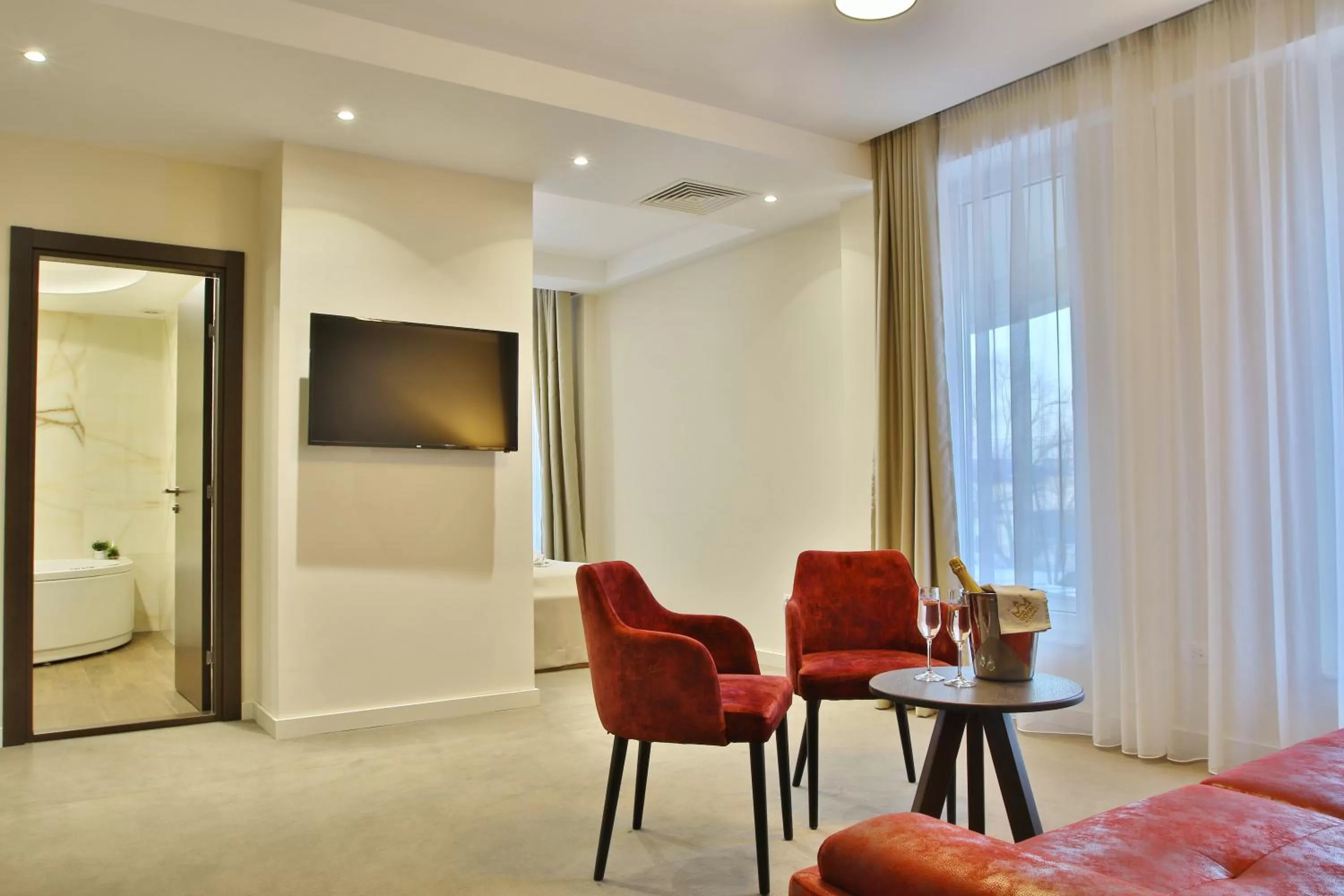 Living room, TV/Entertainment Center in Royal Residence