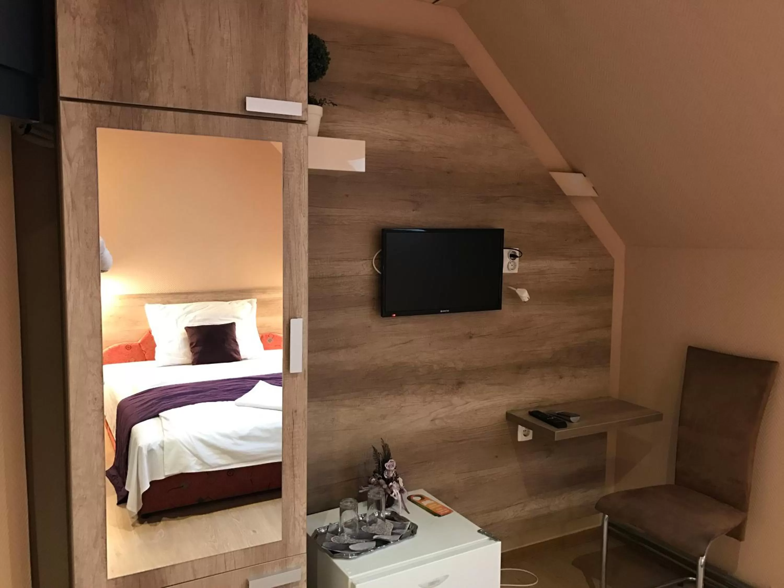 TV/Entertainment Center in Abszolút Hotel és Panzió