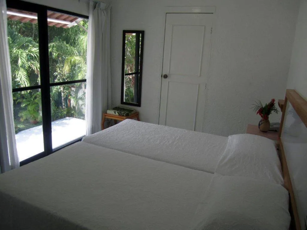 Bedroom, Bed in Hotel Olinalá Diamante