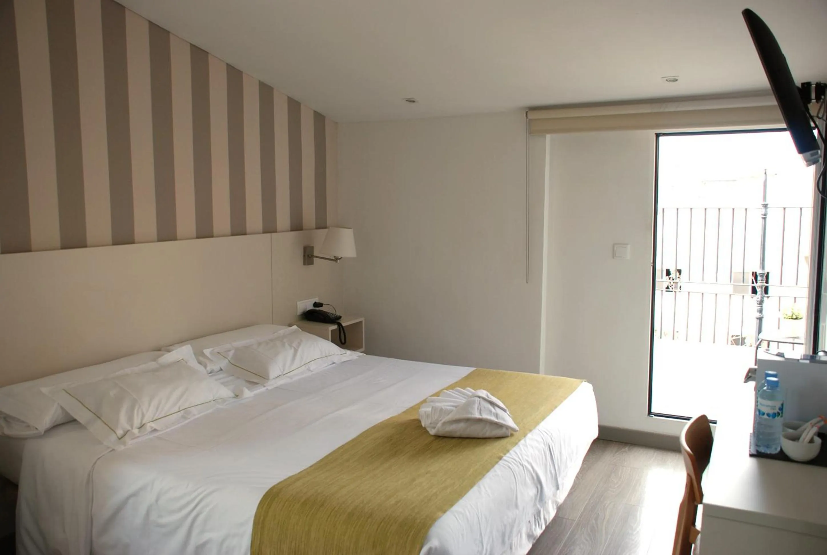 Bed in Hotel San Lorenzo Boutique Plaza