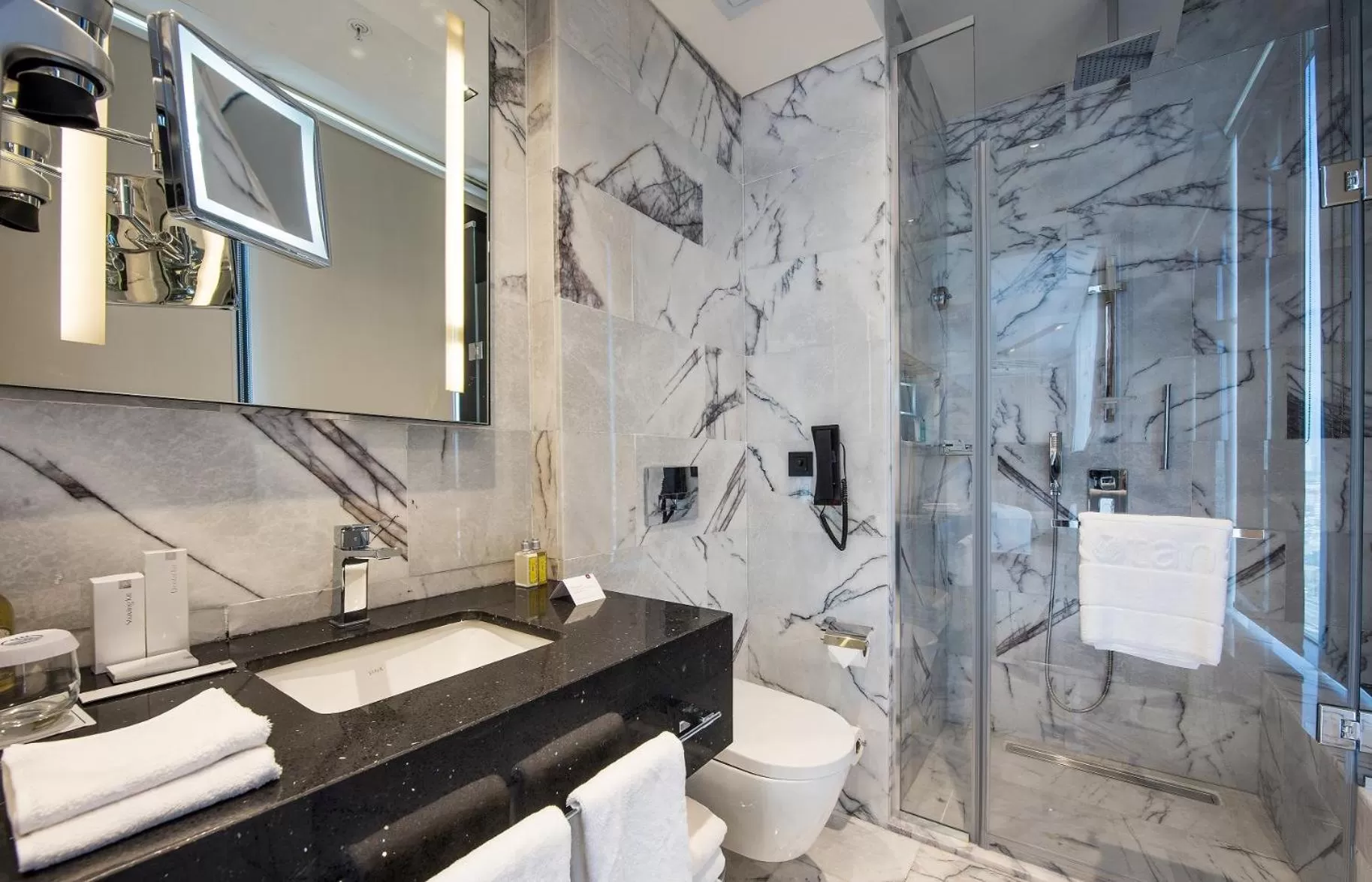 Toilet in WestSide Residences by Rotana