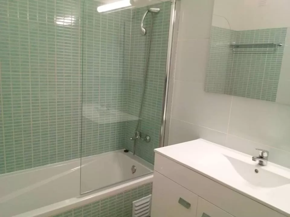 Bathroom in Albufeira Jardim by Umbral