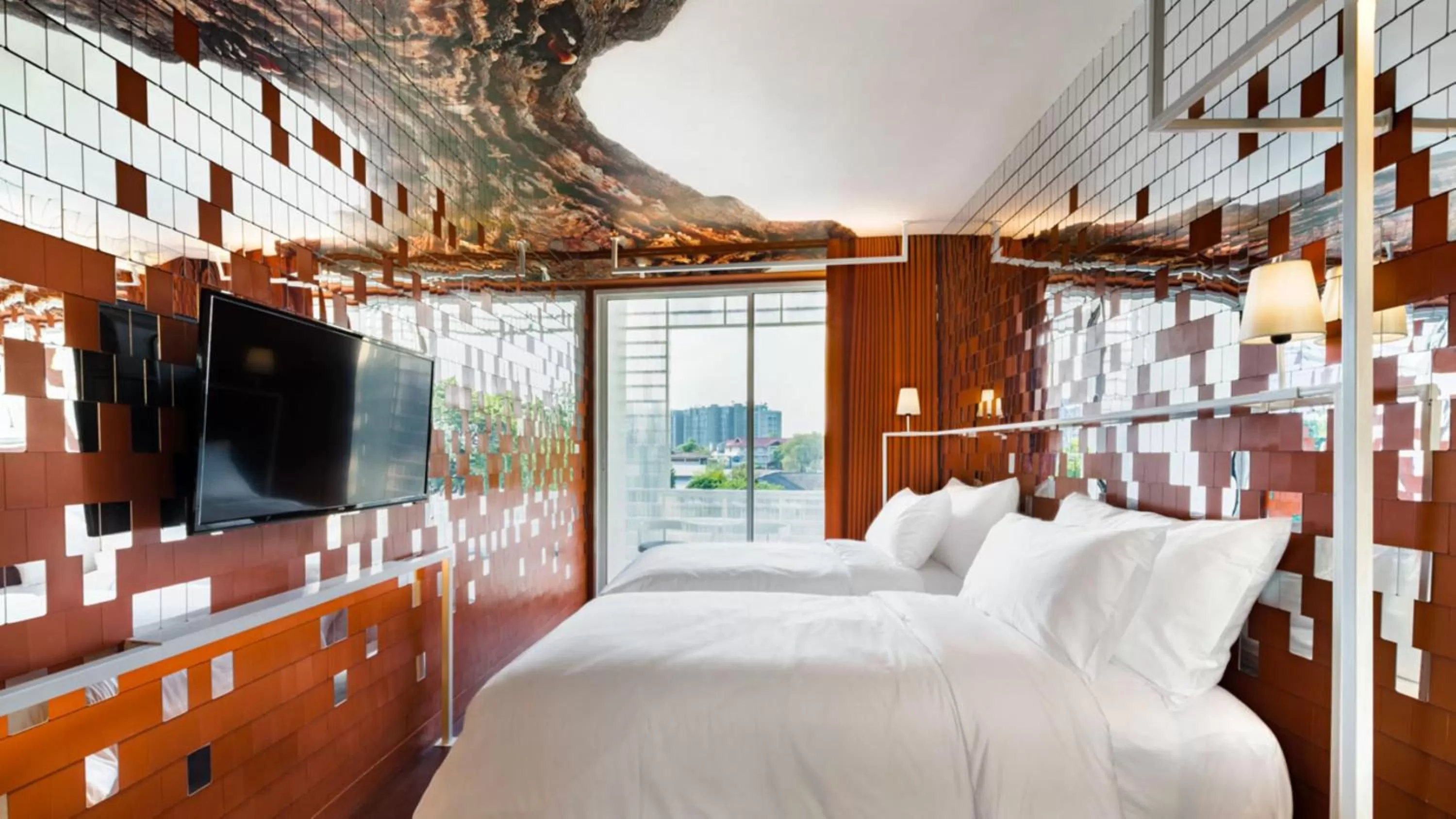 Communal lounge/ TV room, Bed in Little Shelter Hotel Chiangmai