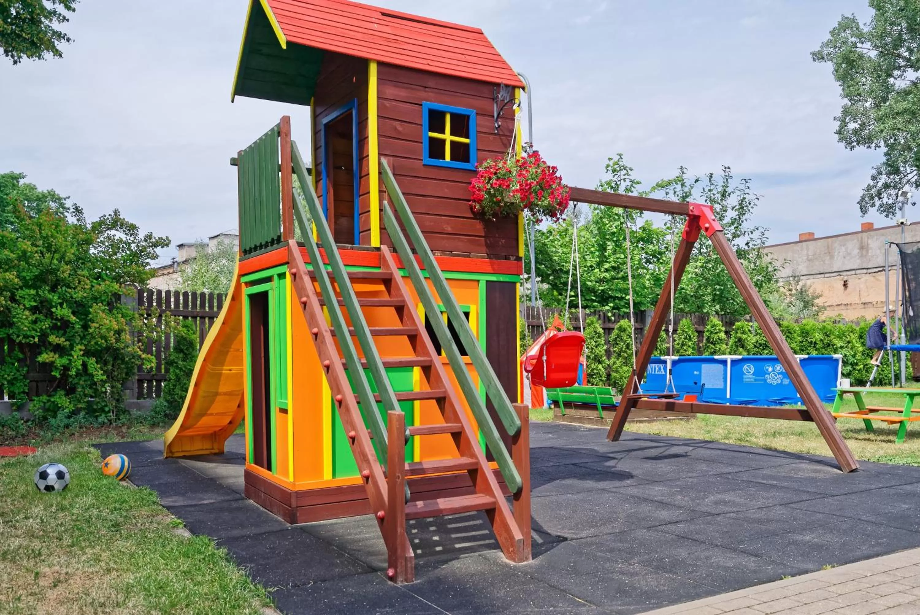 Children play ground in RIGAAPARTMENT SONADA Self-Service Aparthotel - Private Parking