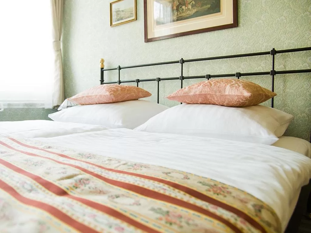 Bed in Hotel Victoria