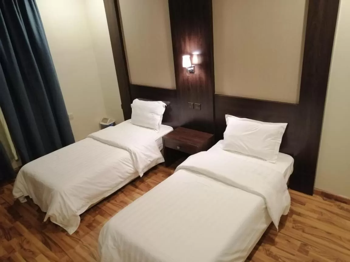 Bed in Drr Ramah Hotel Apartments 10