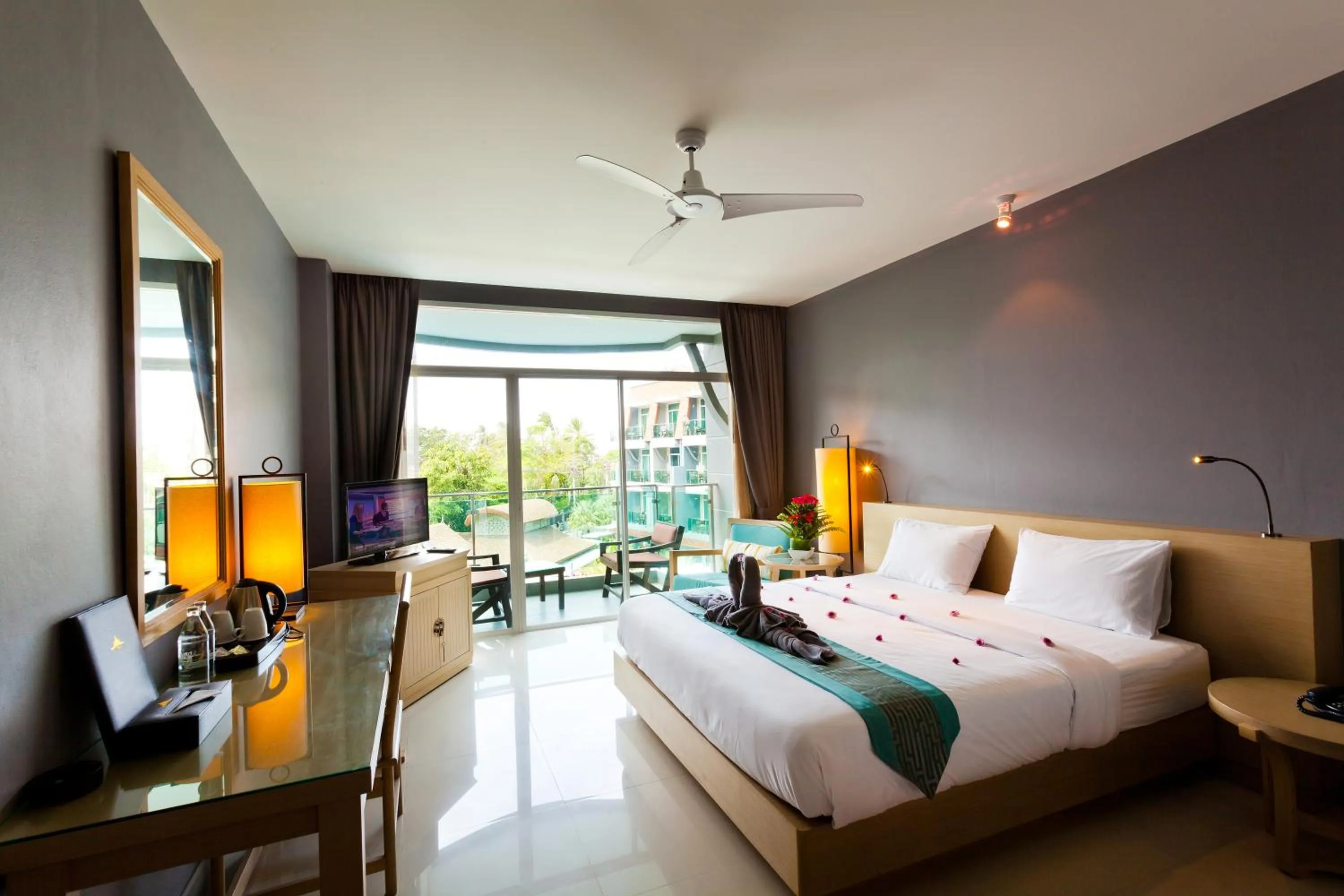 Photo of the whole room, Bed in Ramaburin Resort Patong - SHA Extra Plus