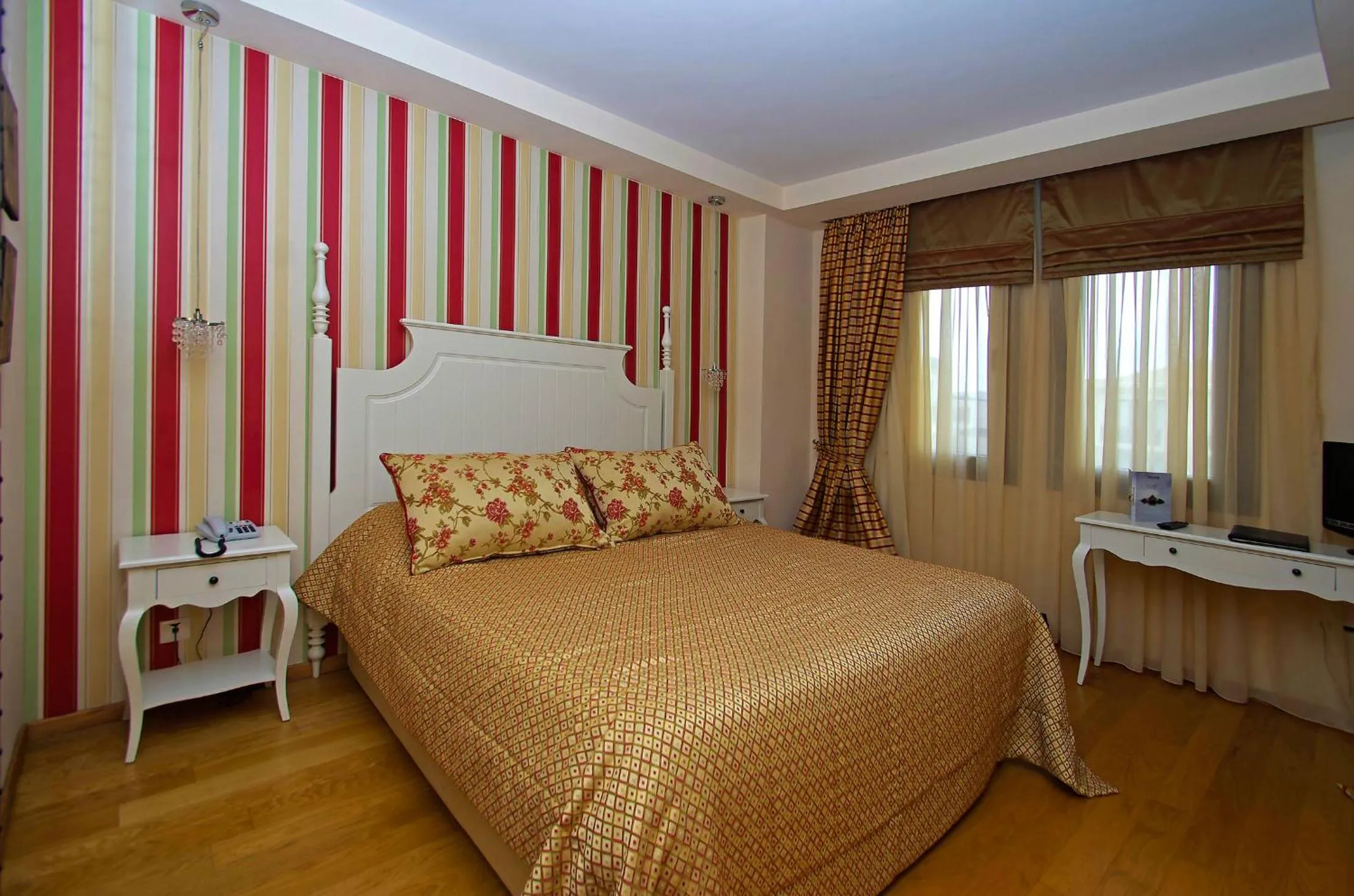 Bed in Mediterranean Village Hotel & Spa