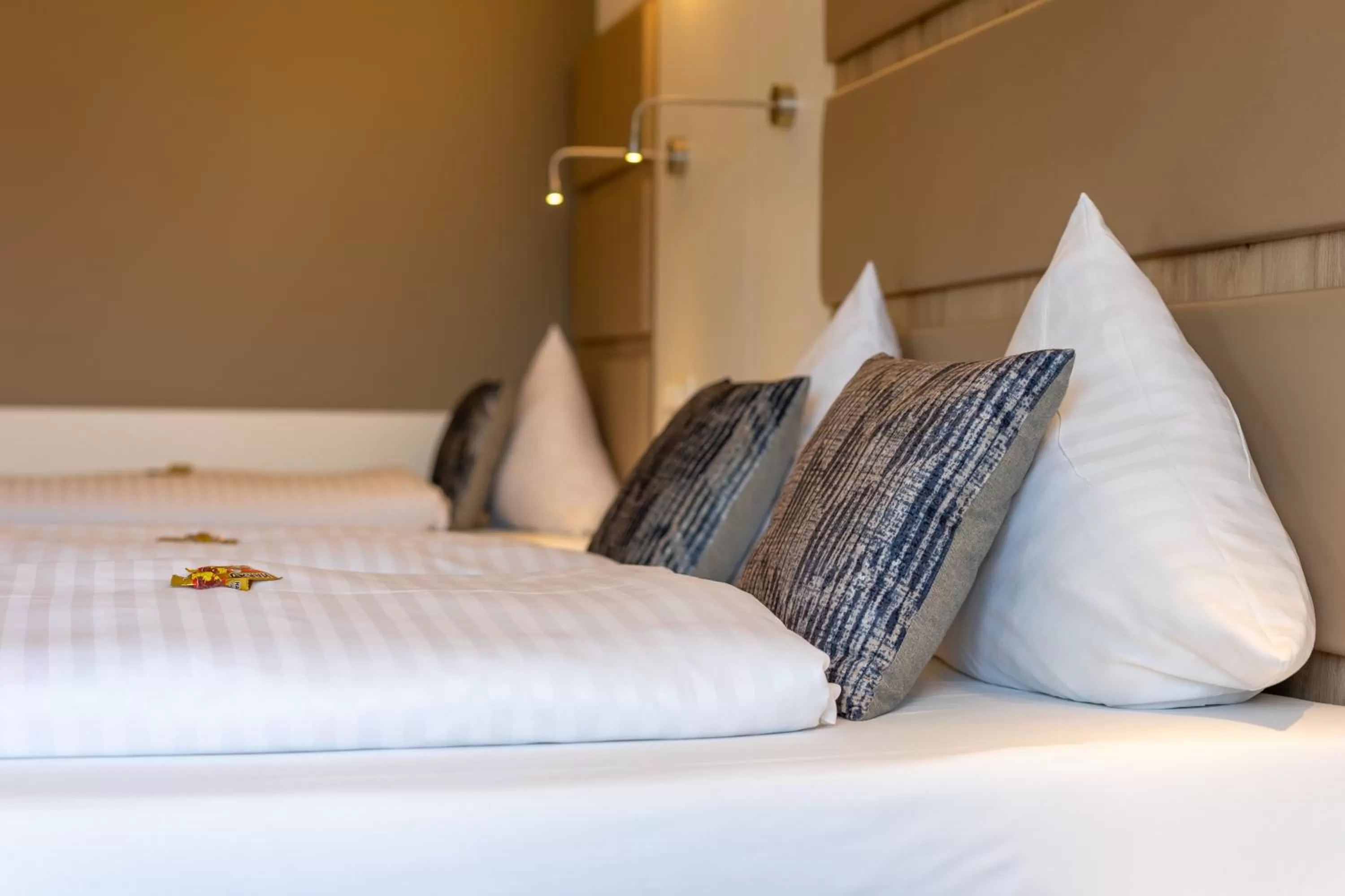 Bed in Confour Hotel