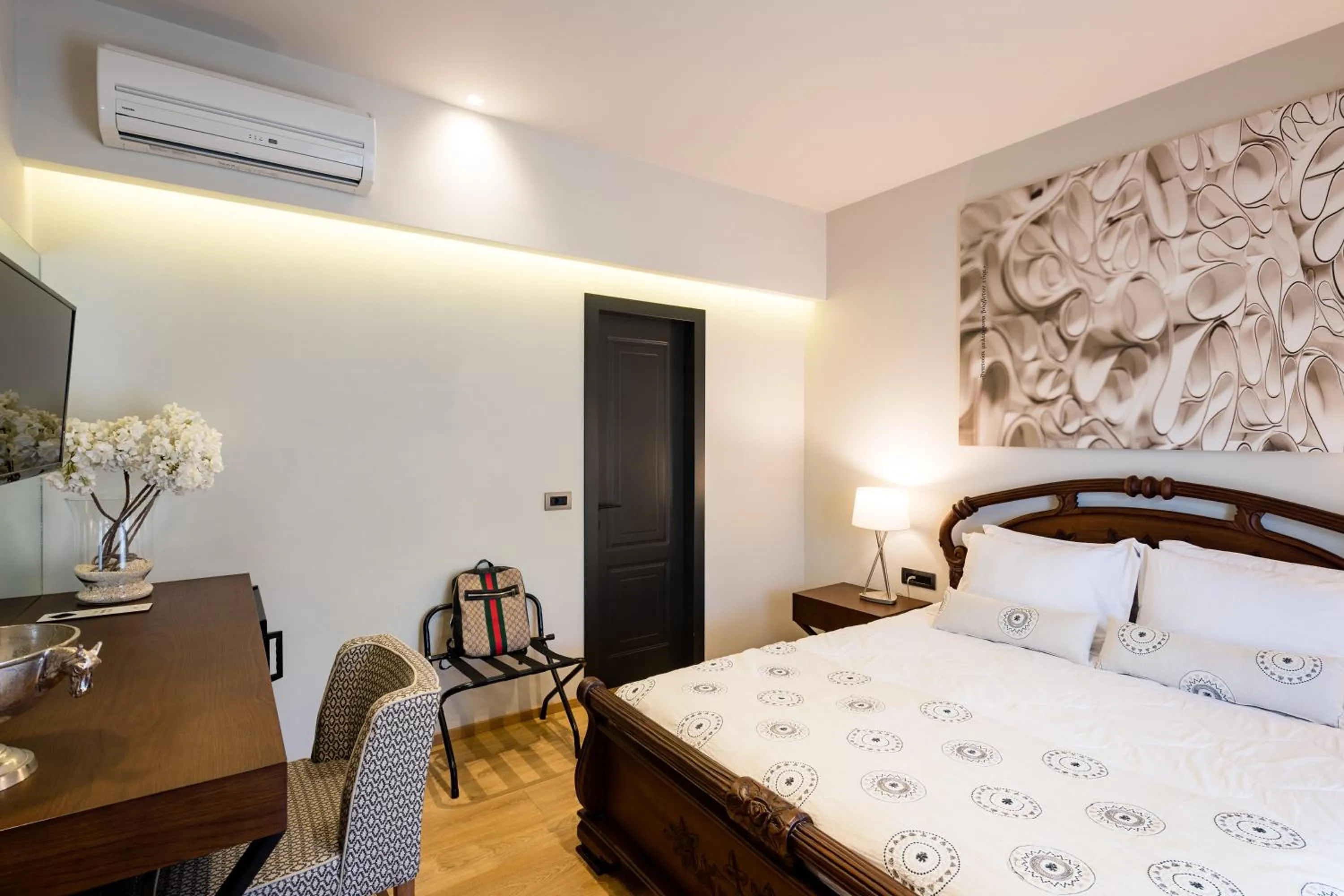 Bed in Anthemion Suites and Villas