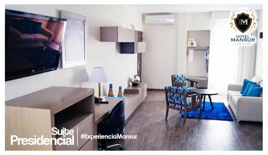 Communal lounge/ TV room in Hotel Mansur Business & Leisure