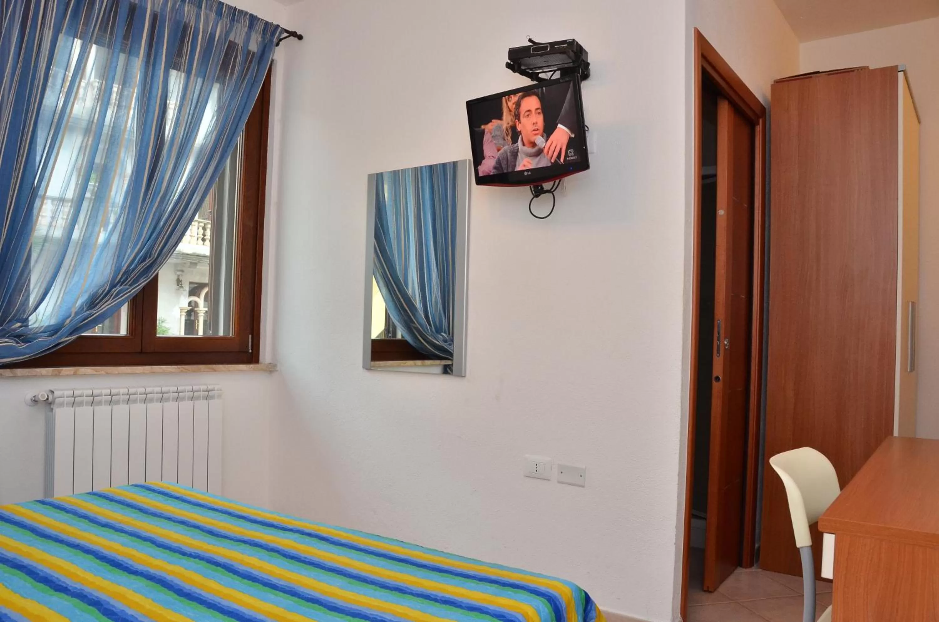 TV/Entertainment Center in Domo - Guest-House Il Nespolo Fiorito