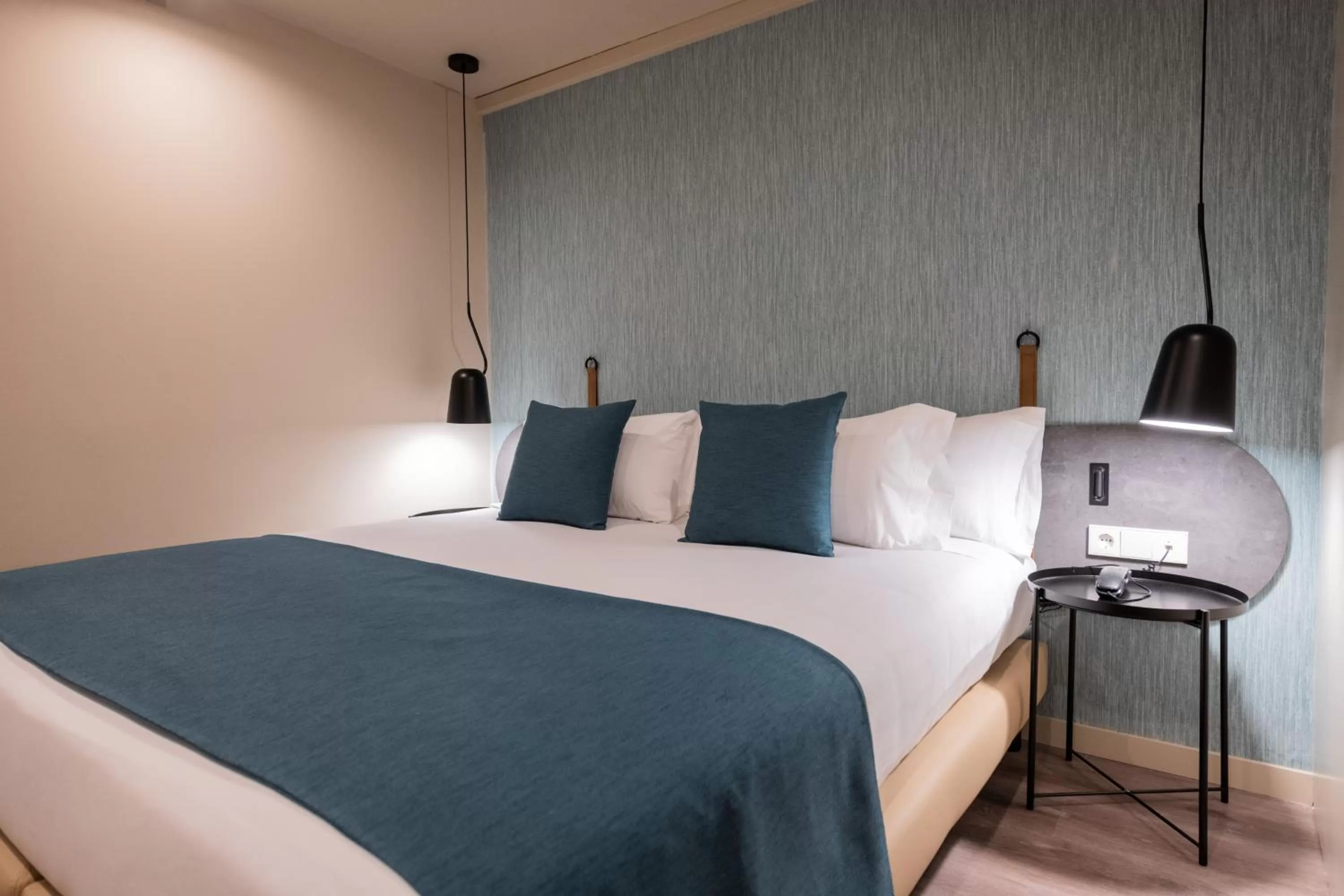 Bed in Atenea Rekord Suites Barcelona