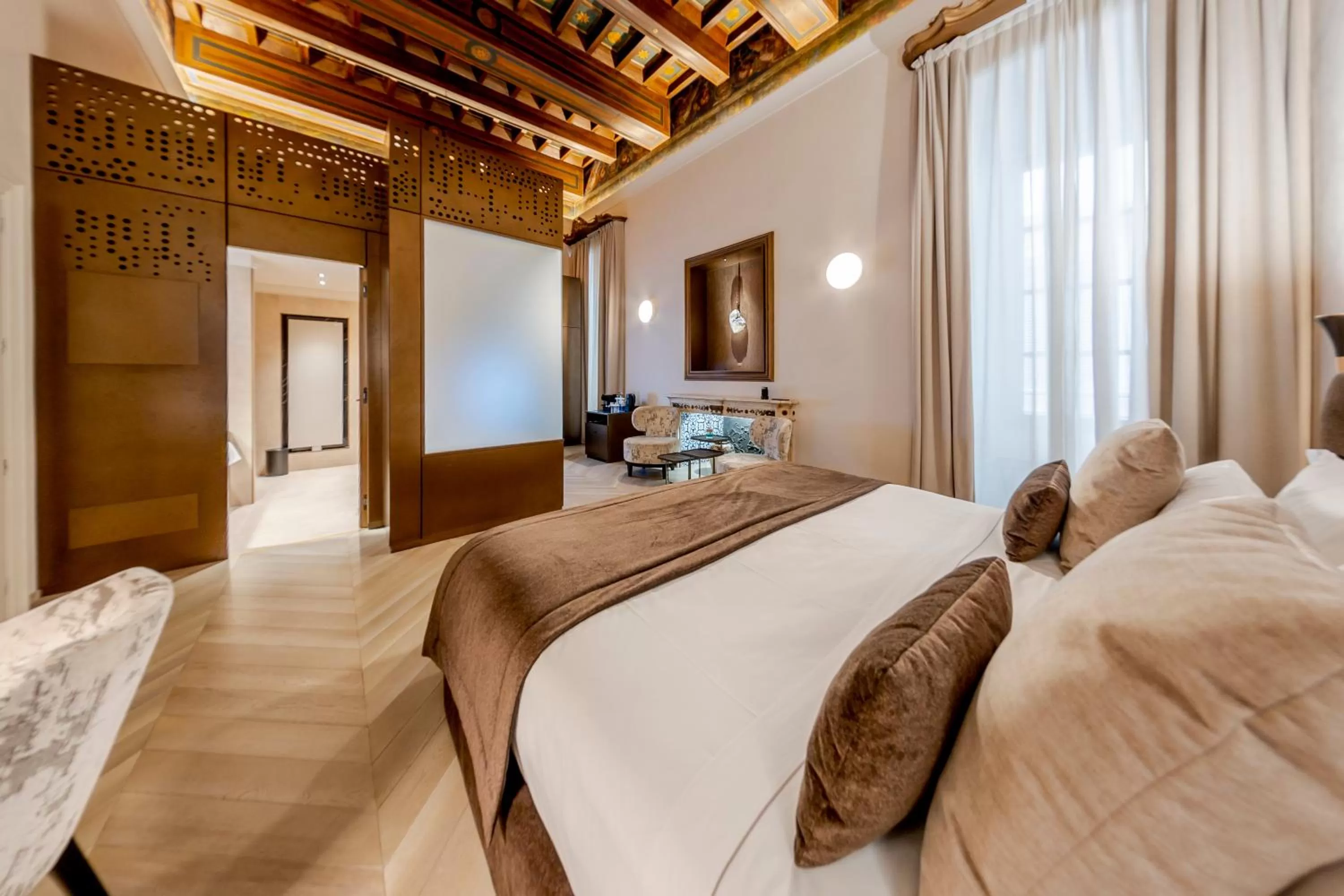 Bed in Martius Private Suites Hotel