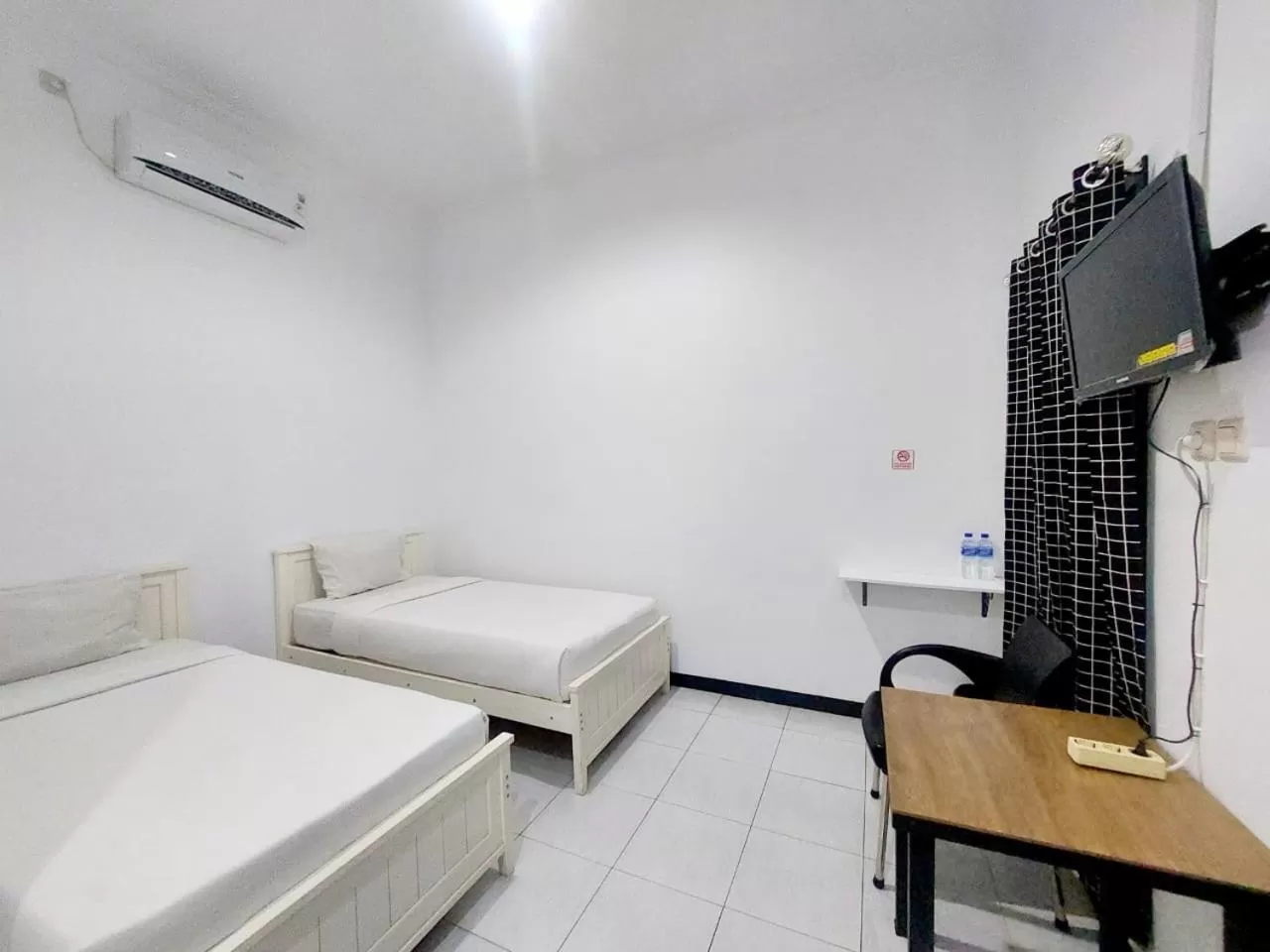 Bed in COZY STAY KUPANG