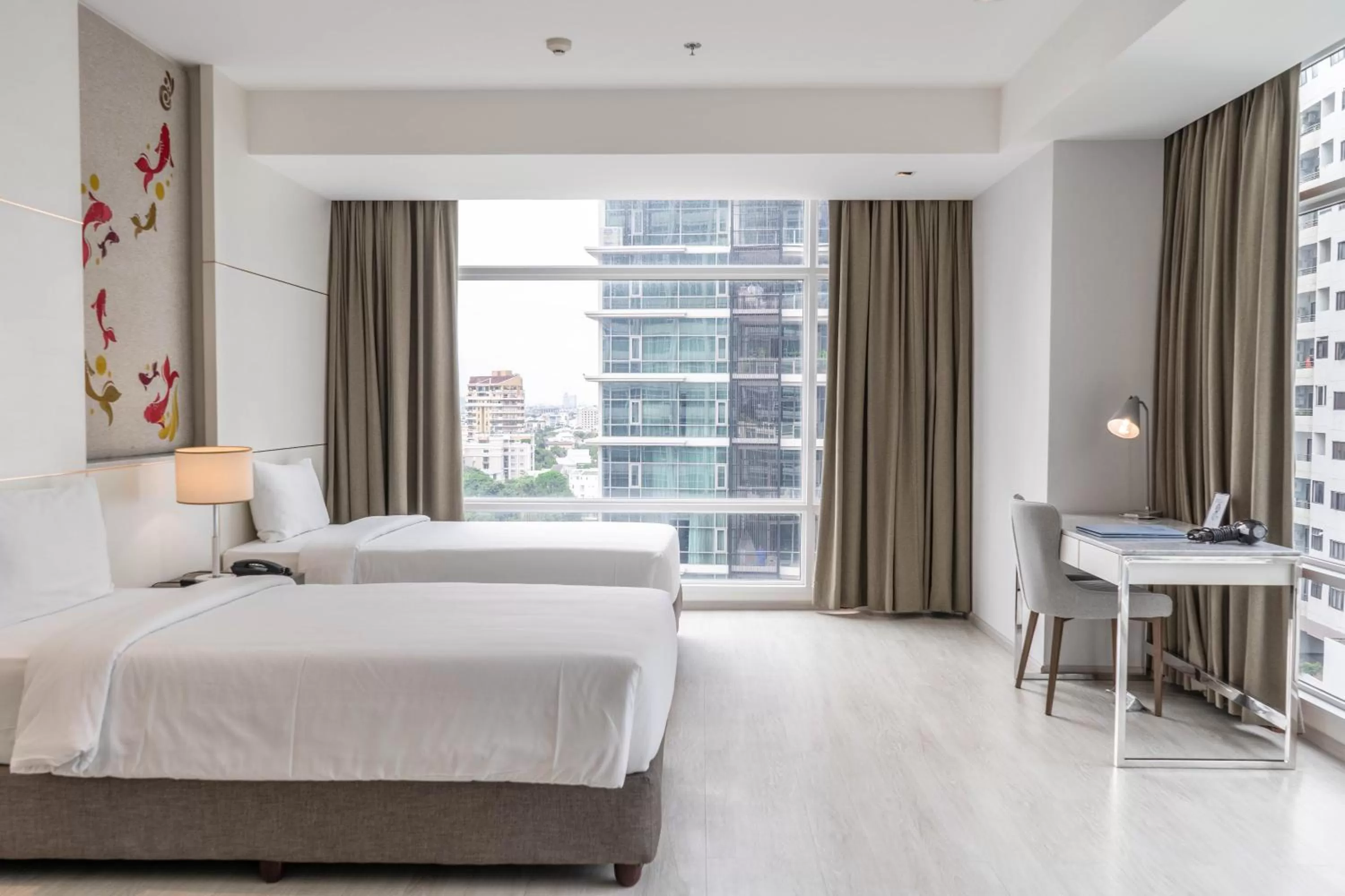 Bed in Jasmine 59 Hotel