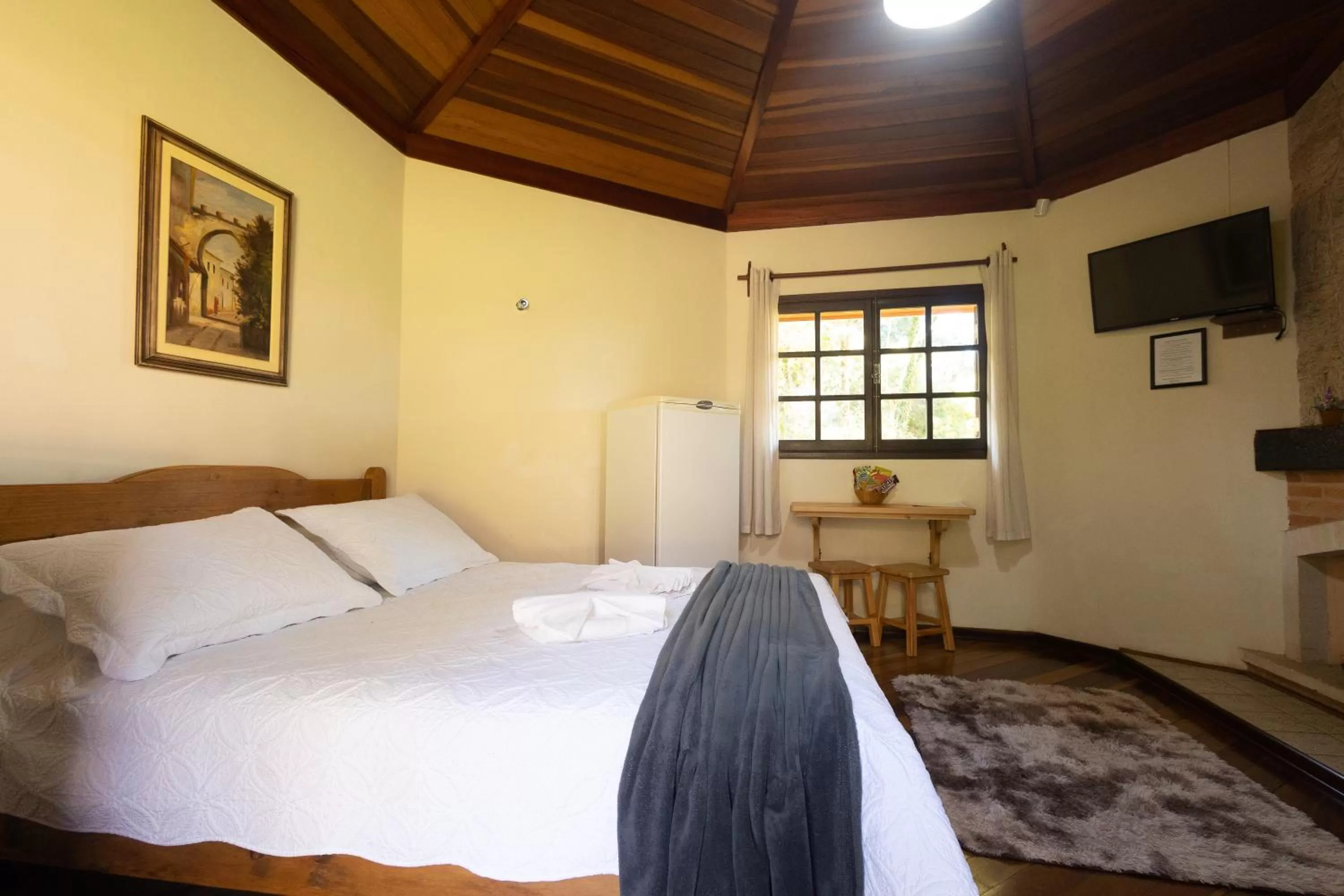 Bed in Chalés 3 Pinheiros