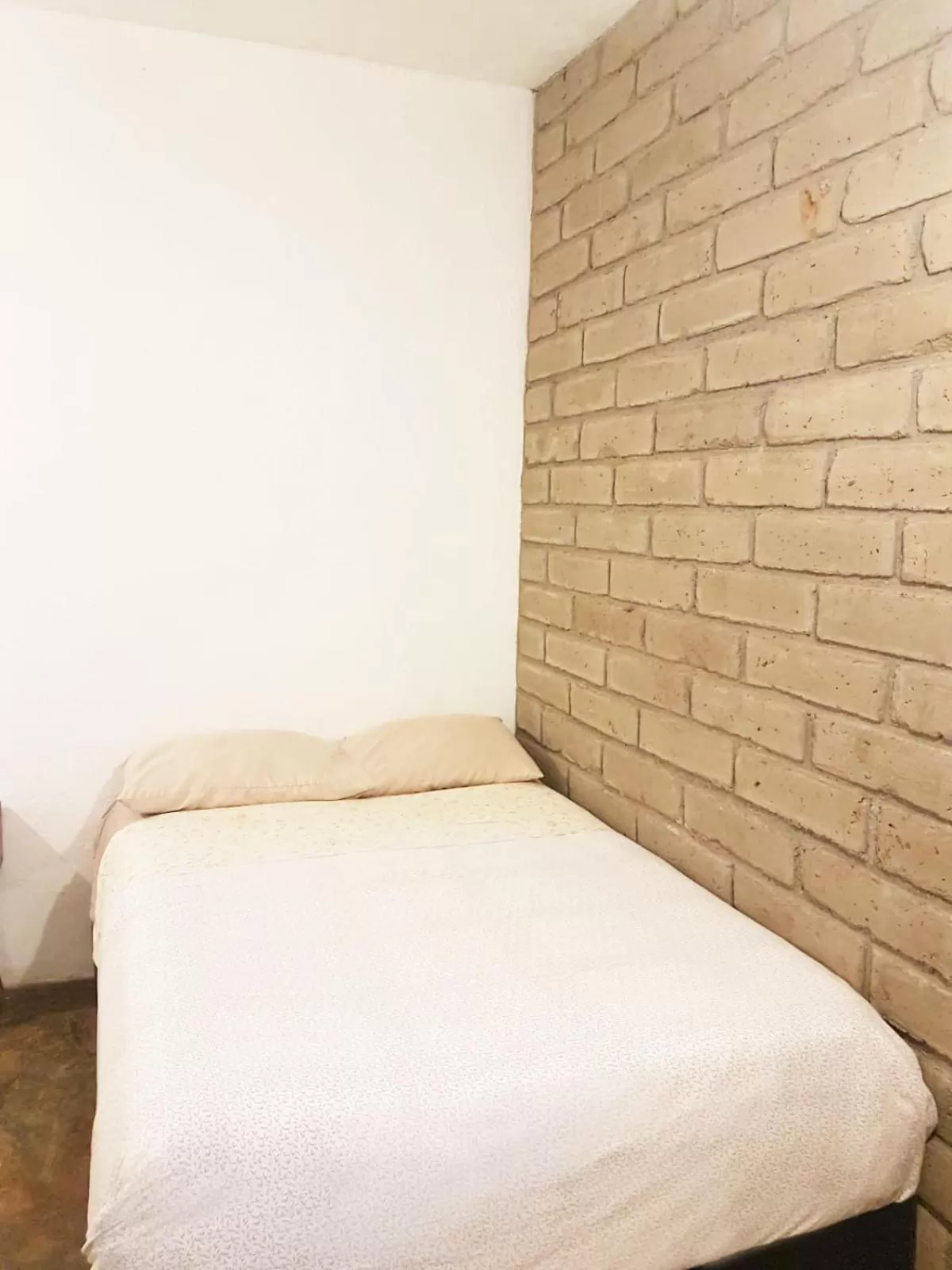 Bed in Hostal Hoja Santa