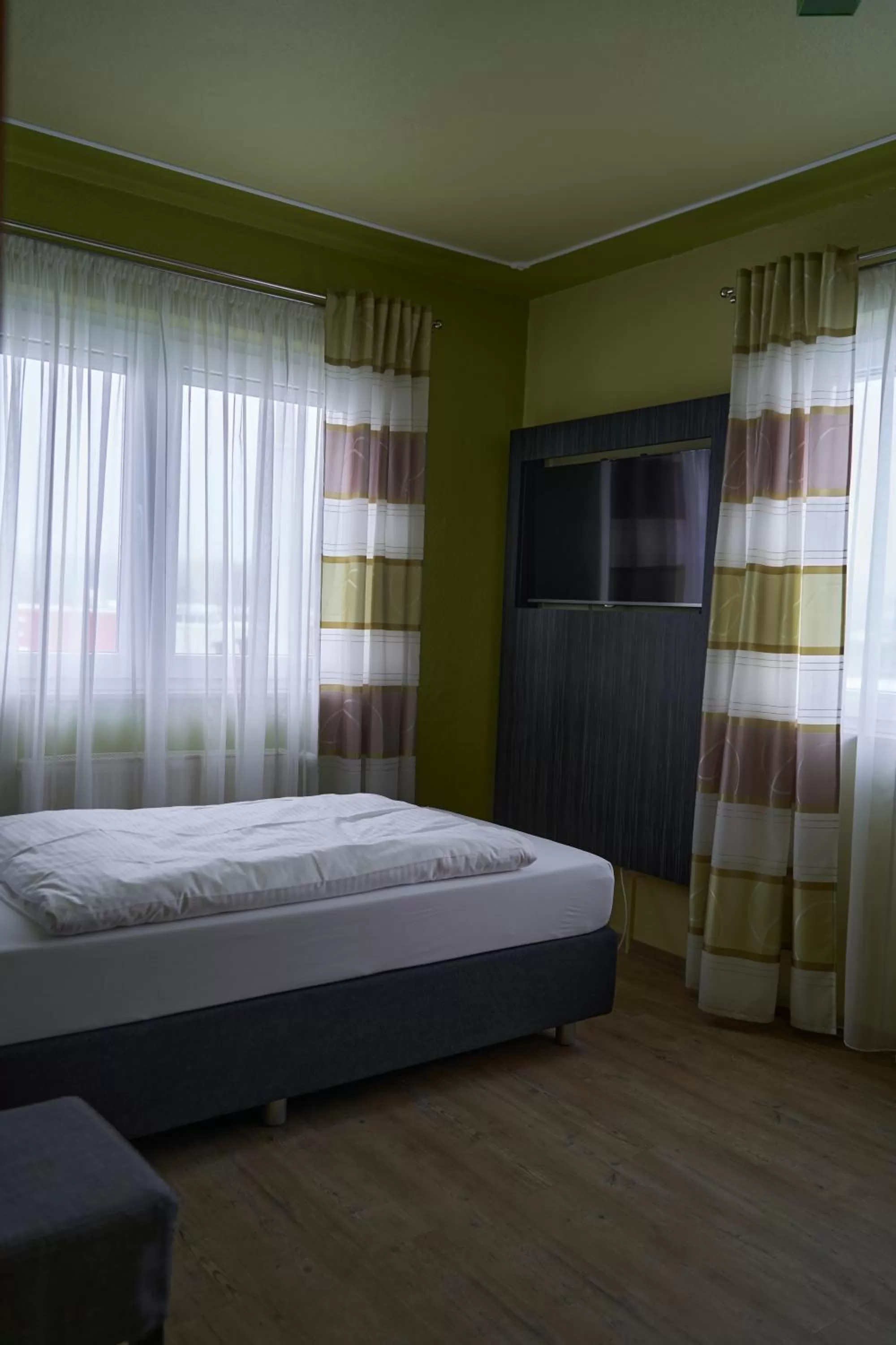 Bedroom, Bed in Hotel Auszeit im Euro Rastpark Guxhagen