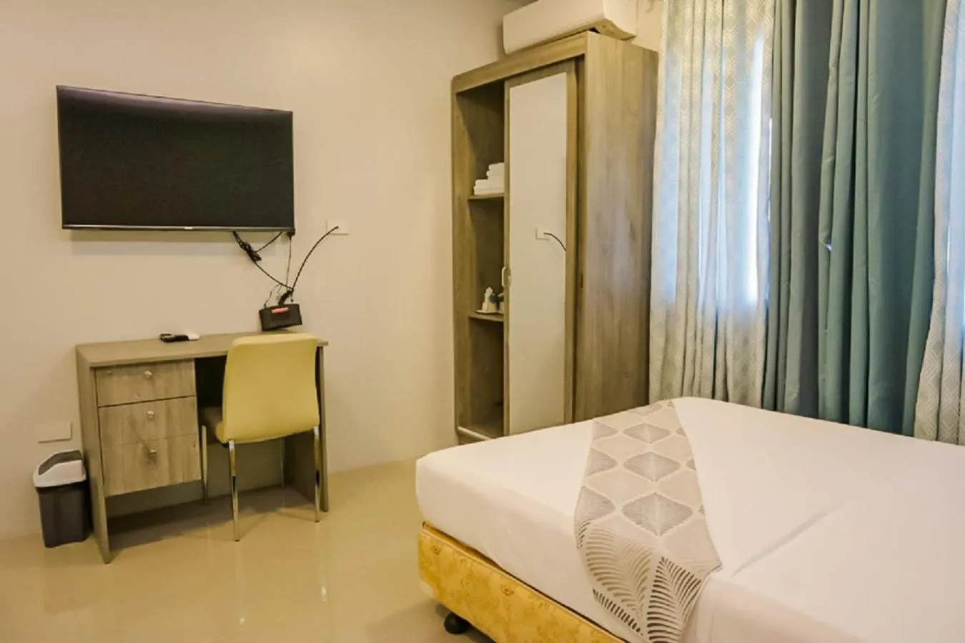 TV and multimedia, Bed in Carcar Eco Farm Resorts