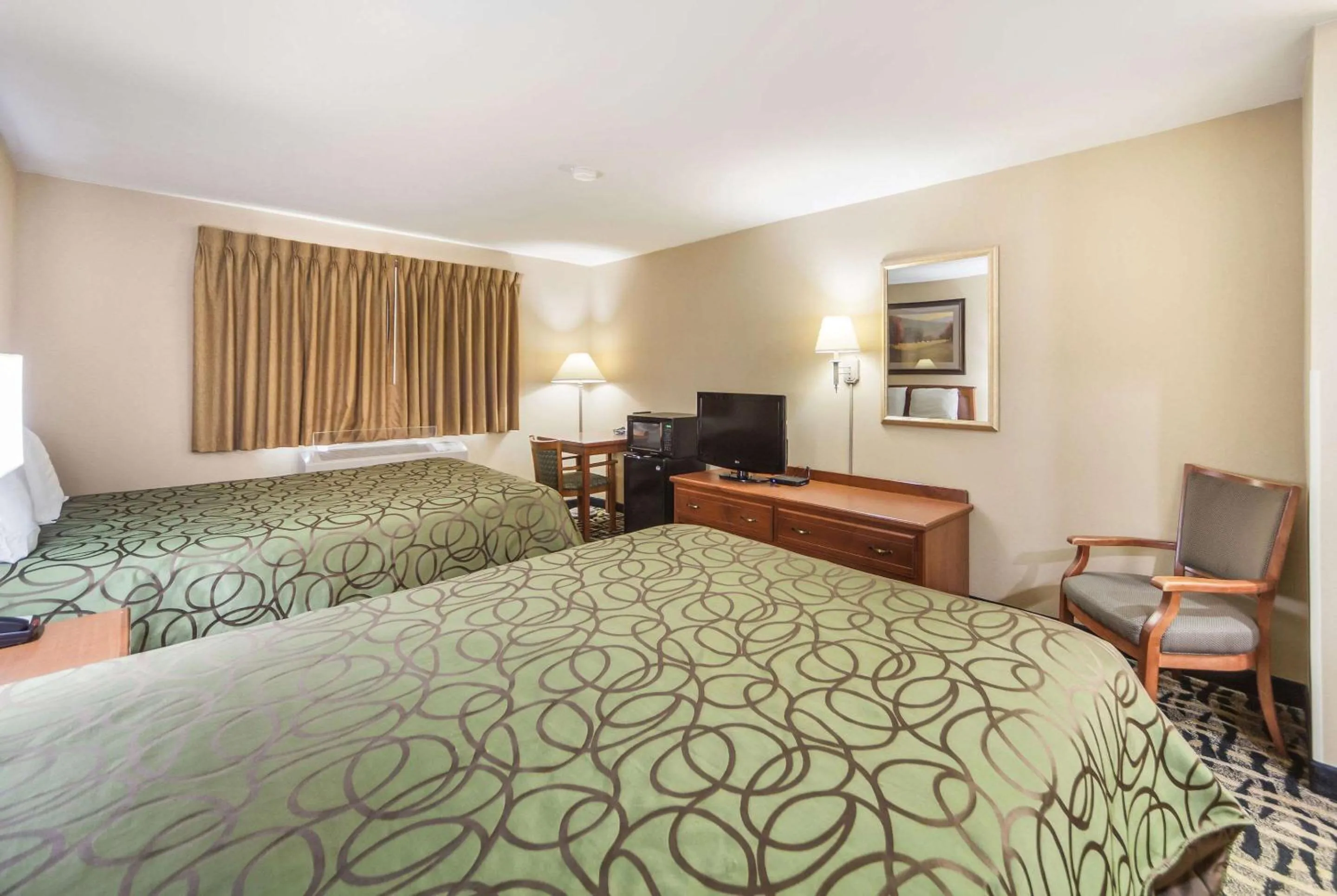 Queen Room with Two Queen Beds - Non-Smoking in Rodeway Inn