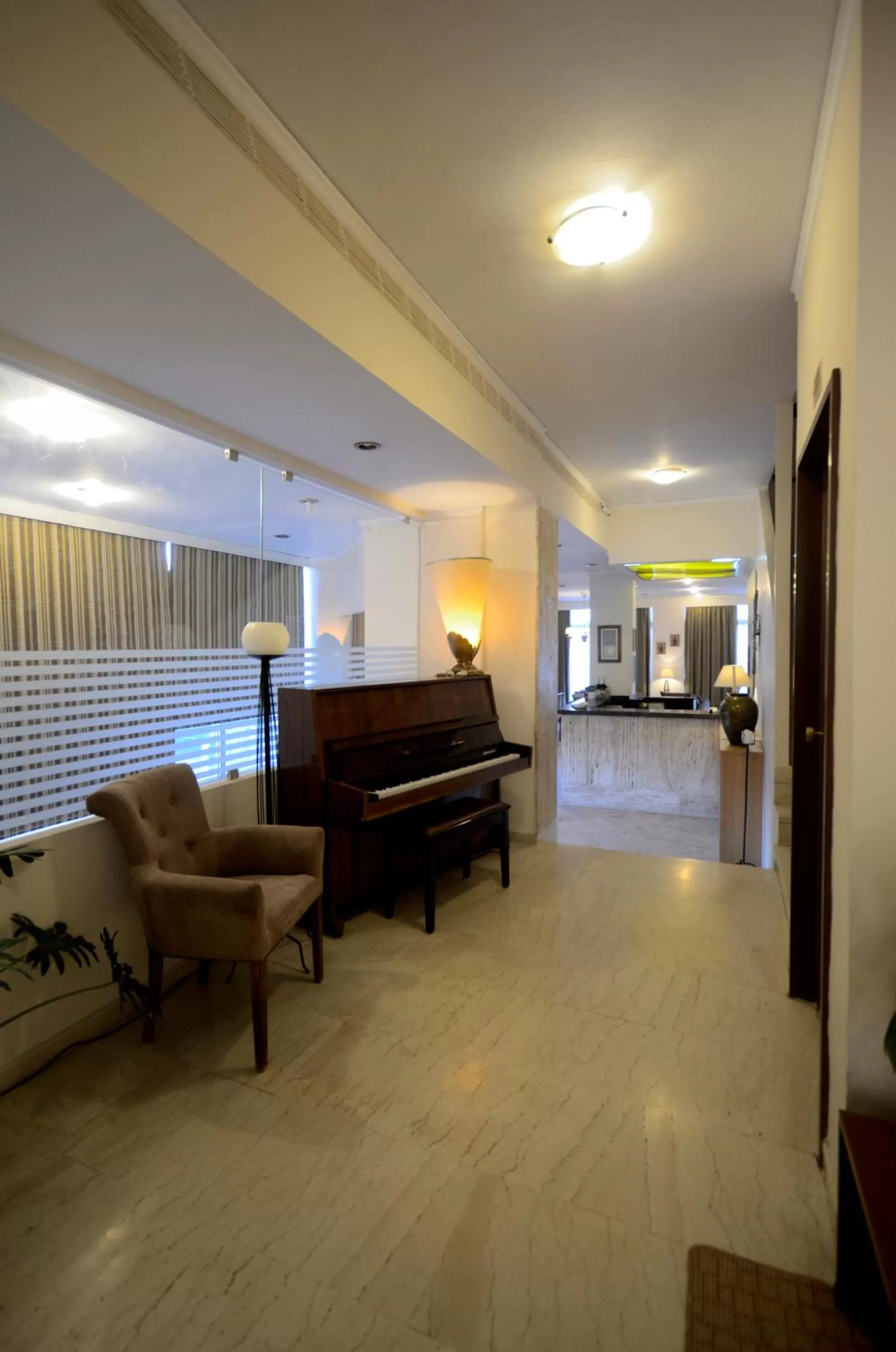 Communal lounge/ TV room in Messini Hotel