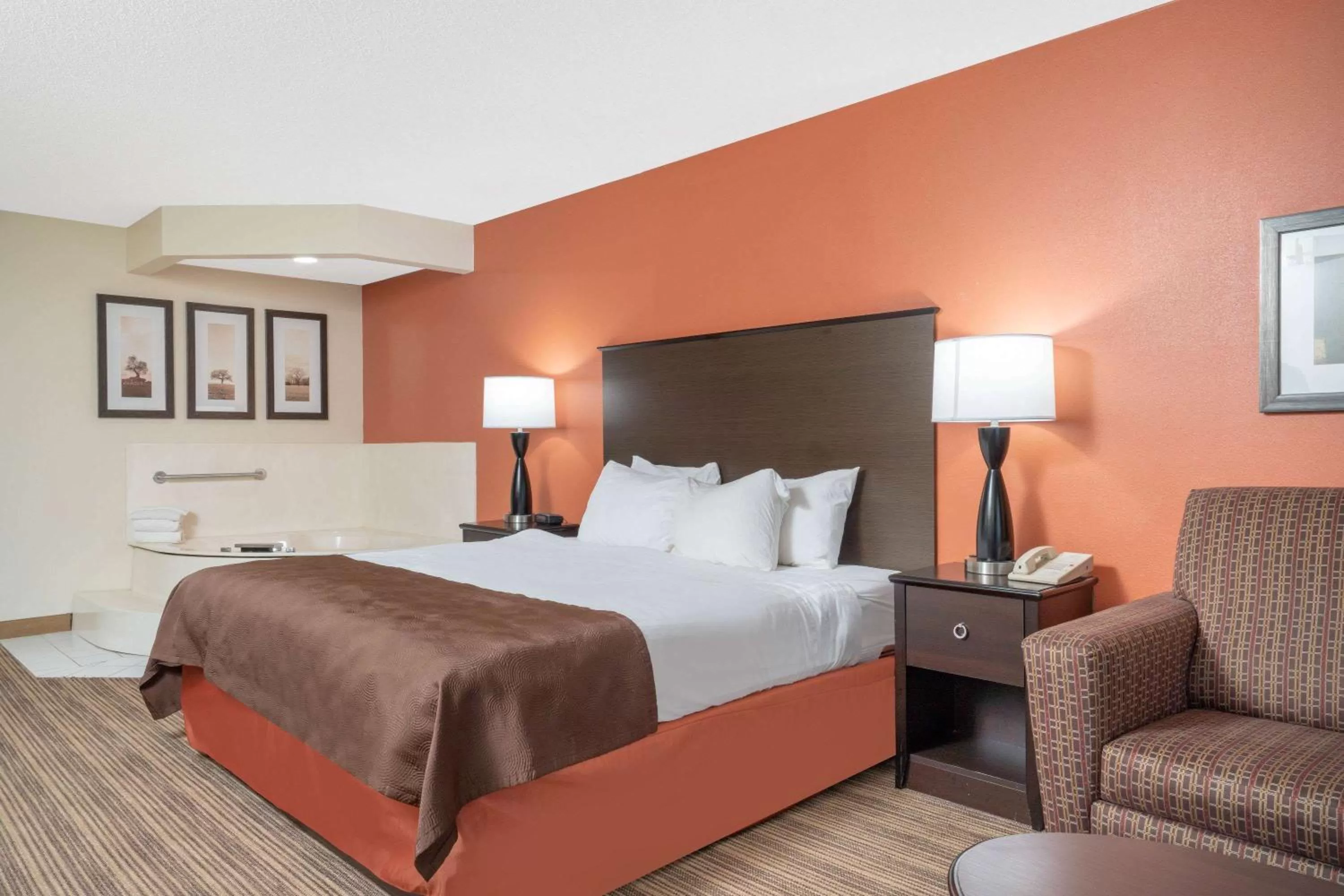 Photo of the whole room, Bed in AmericInn by Wyndham Rogers