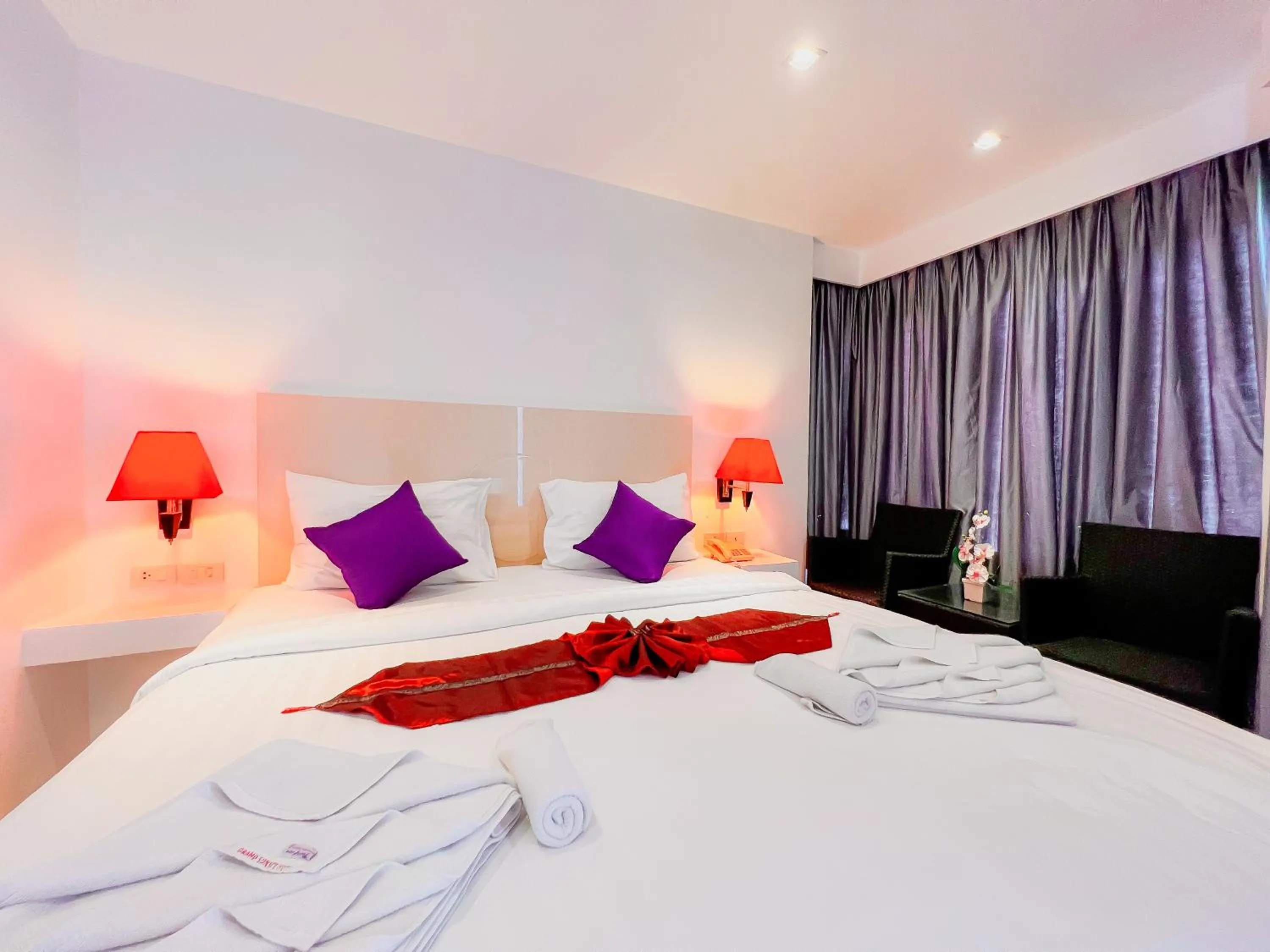 Bed in Grand Sunset Hotel Phuket