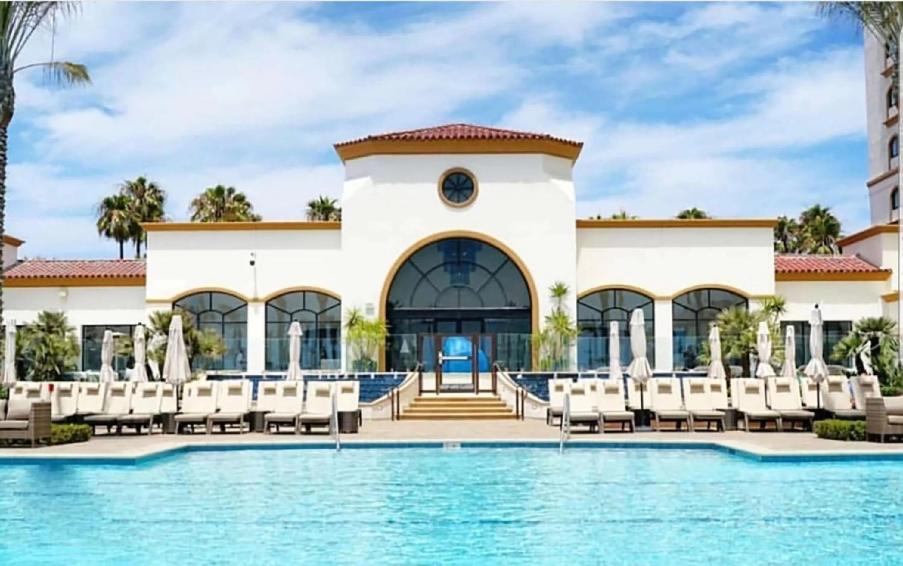 Pool view in The Waterfront Beach Resort, A Hilton Hotel