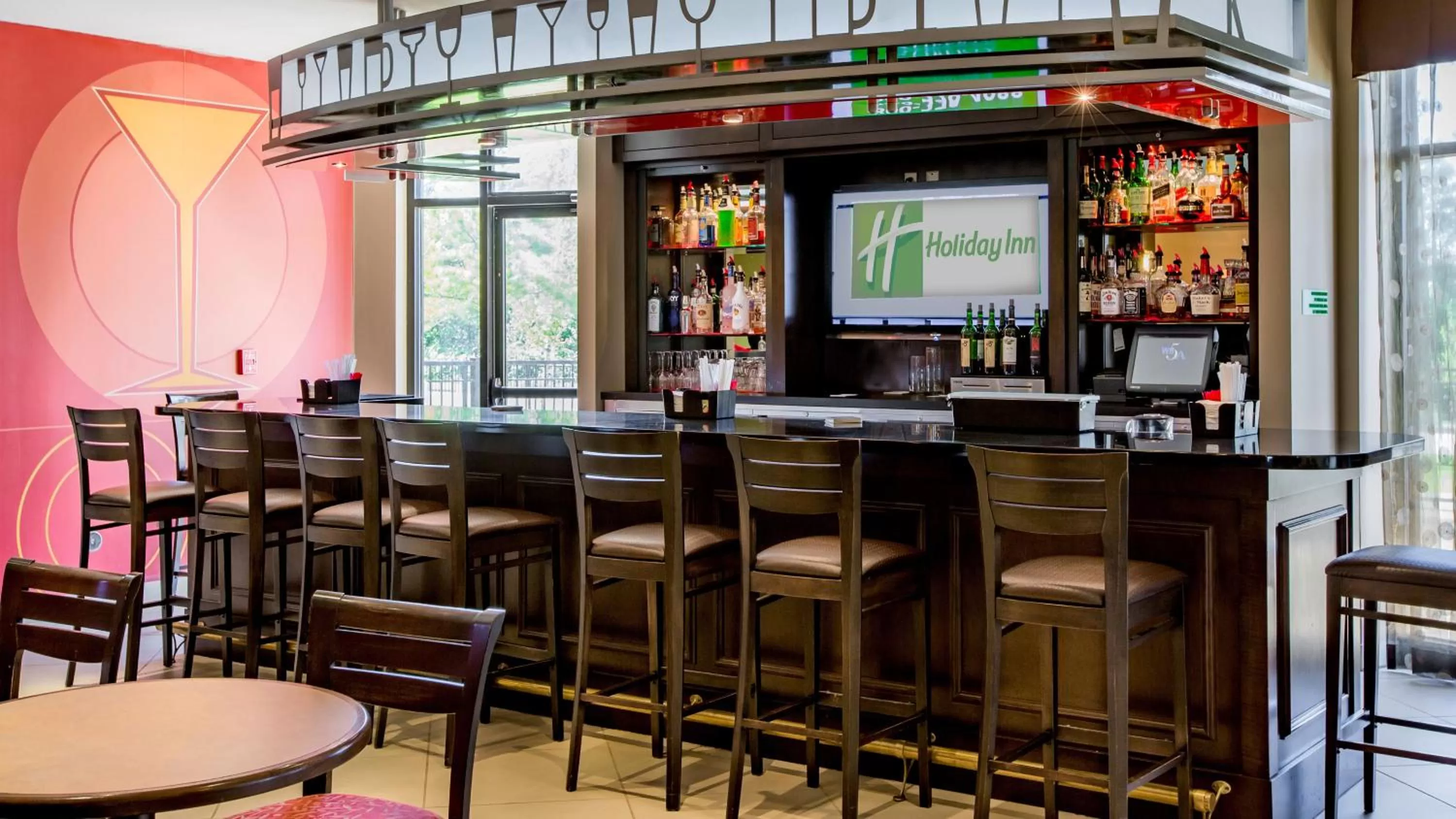 Lounge or bar in Holiday Inn Oklahoma City Airport by IHG