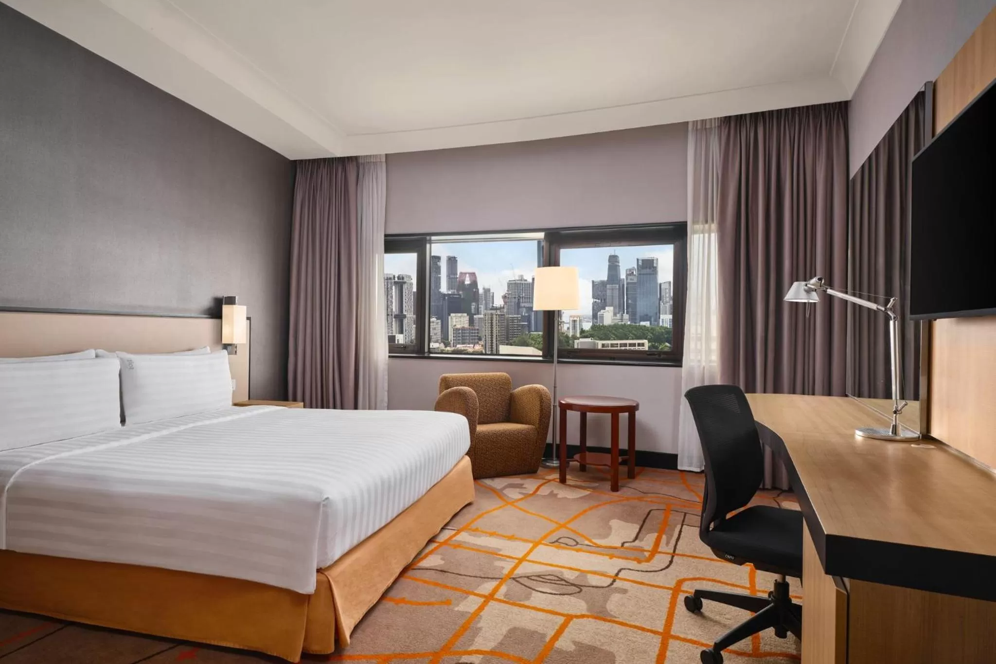 Photo of the whole room, Bed in Holiday Inn Singapore Atrium by IHG