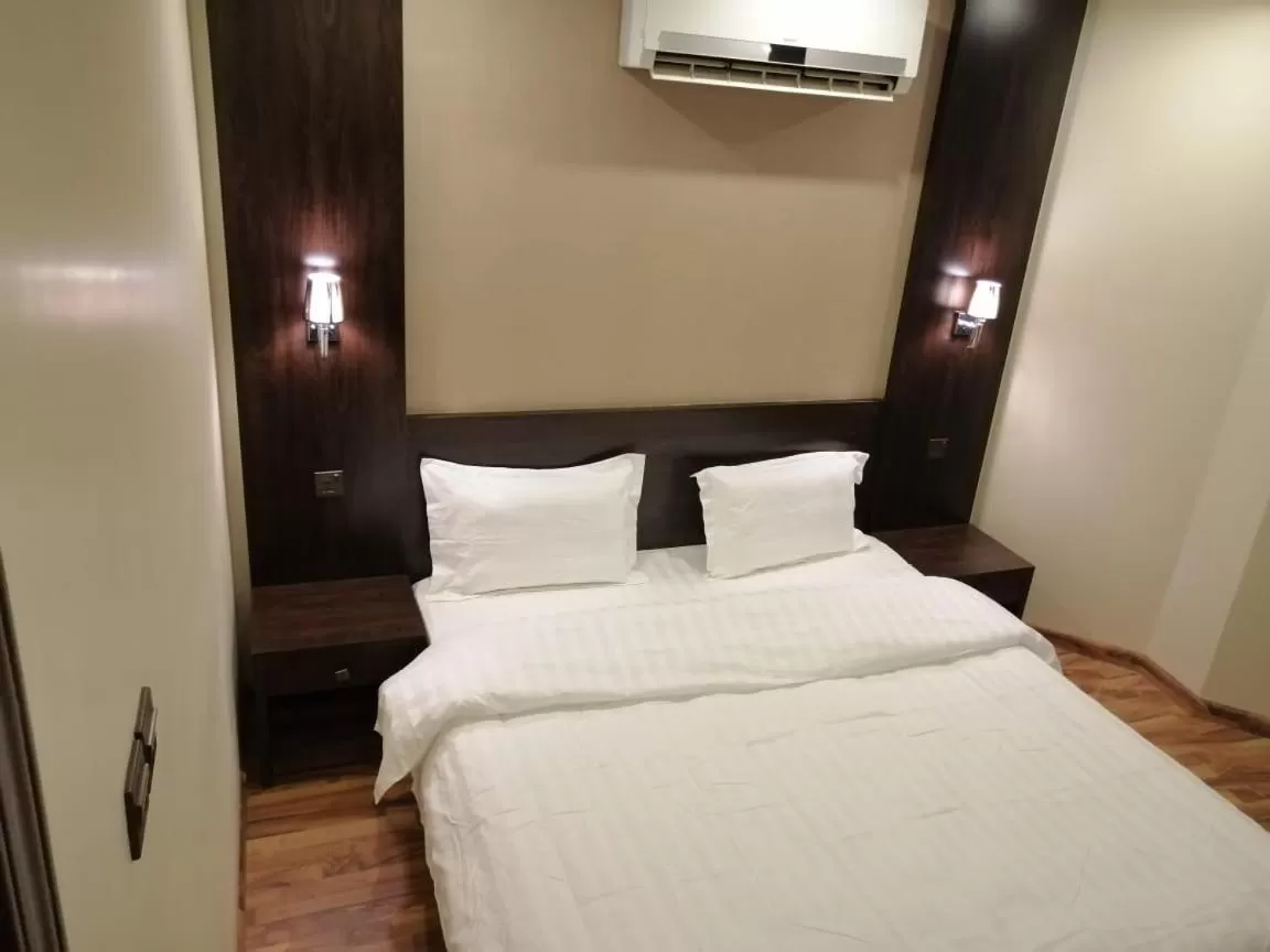 Bed in Drr Ramah Hotel Apartments 10
