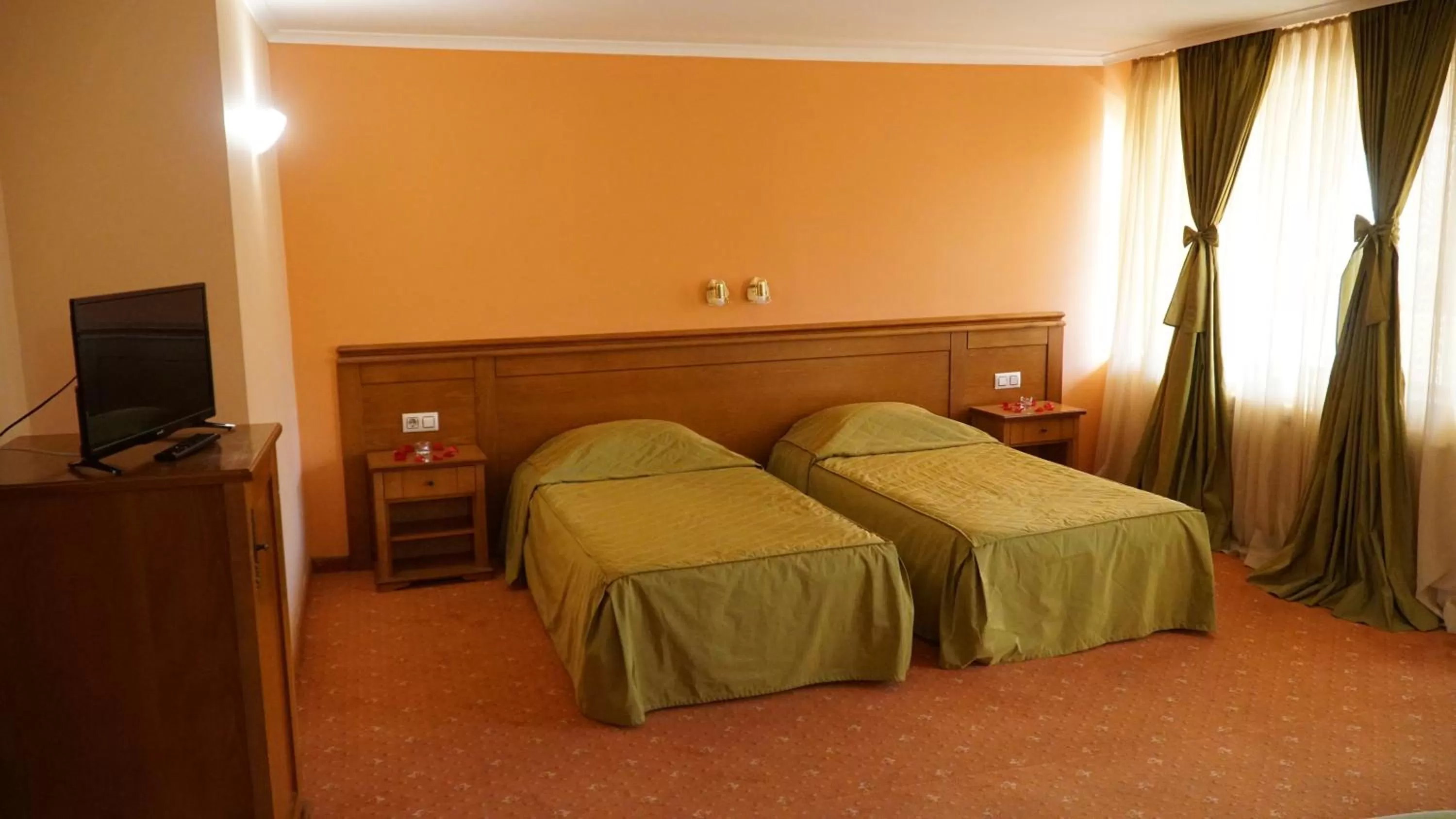Bed in Troyan Plaza Hotel