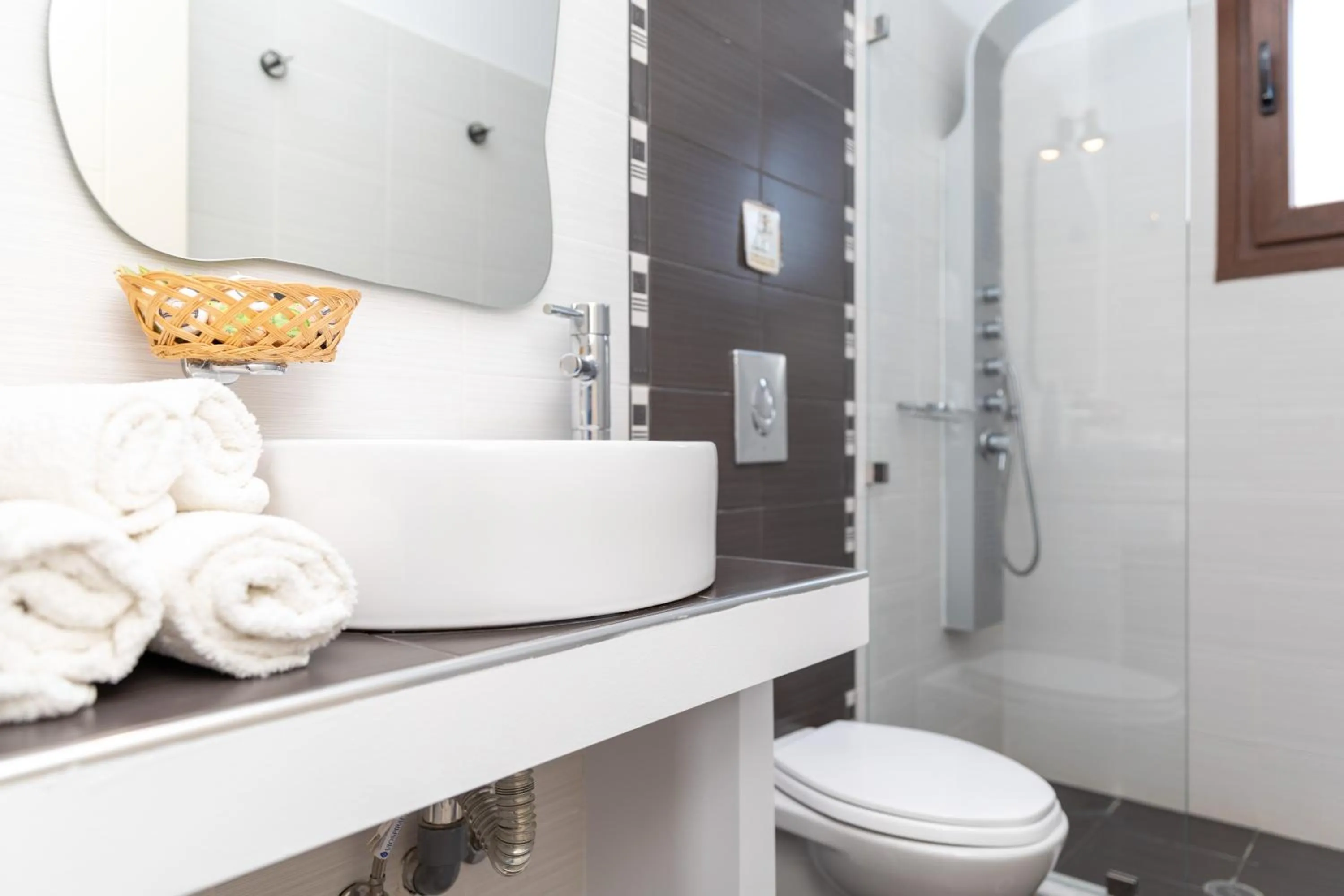 Bathroom in Depis Place and Apartments