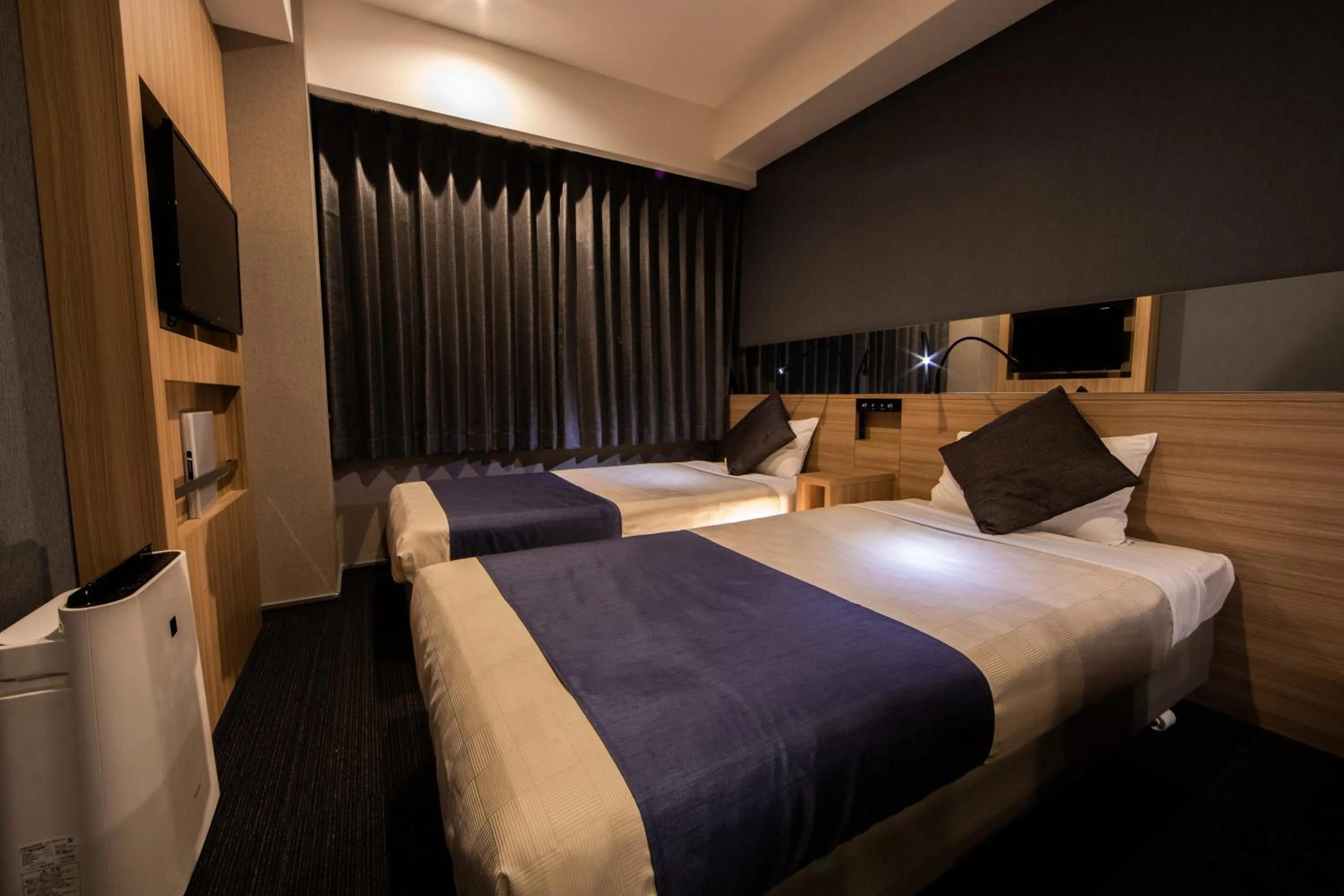 Photo of the whole room, Bed in Quintessa Hotel Osaka Shinsaibashi Comic & Books